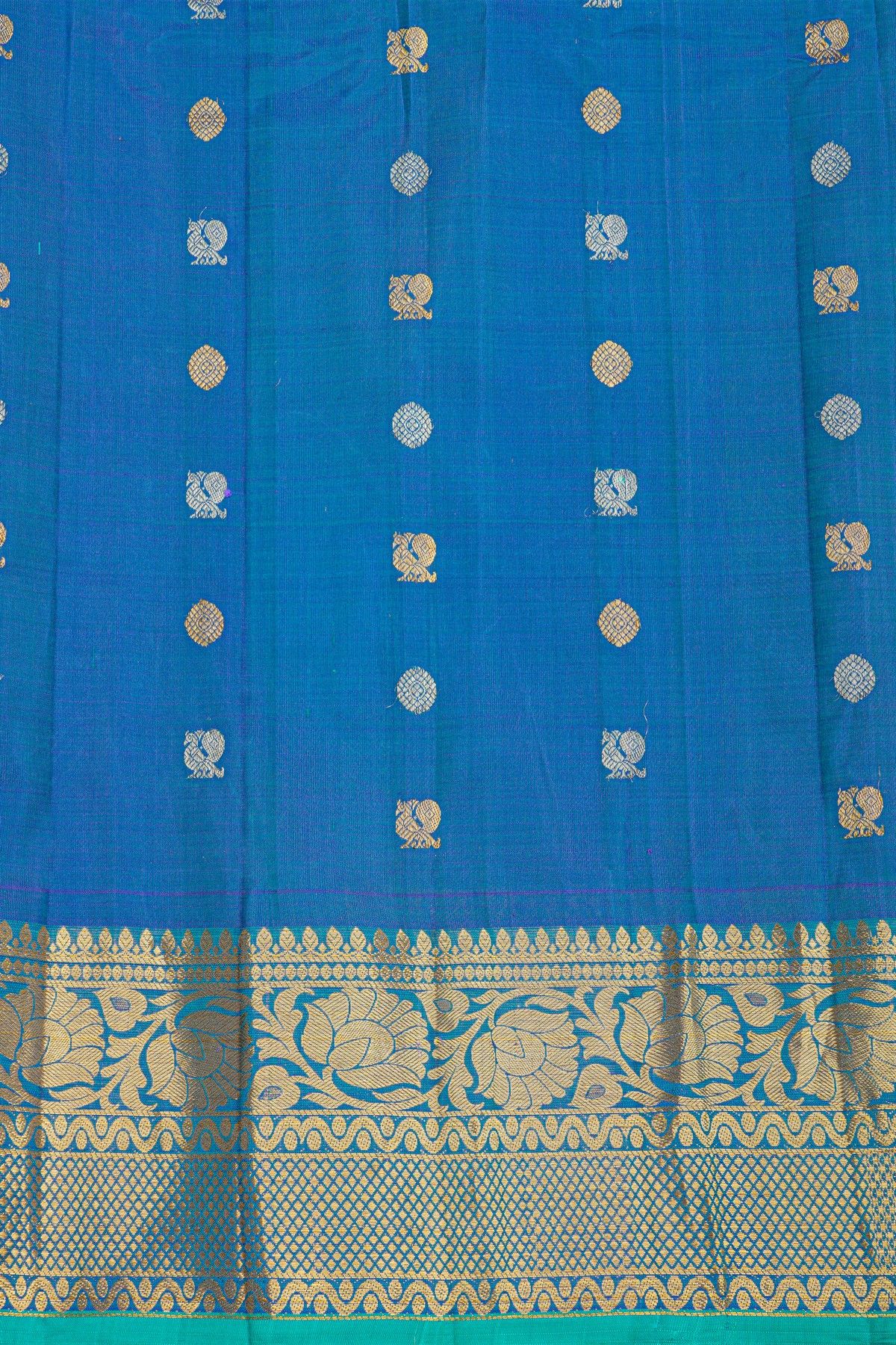 Gadwal Silk Sea Blue Saree With Florals And Peacocks In Zari Checks Body