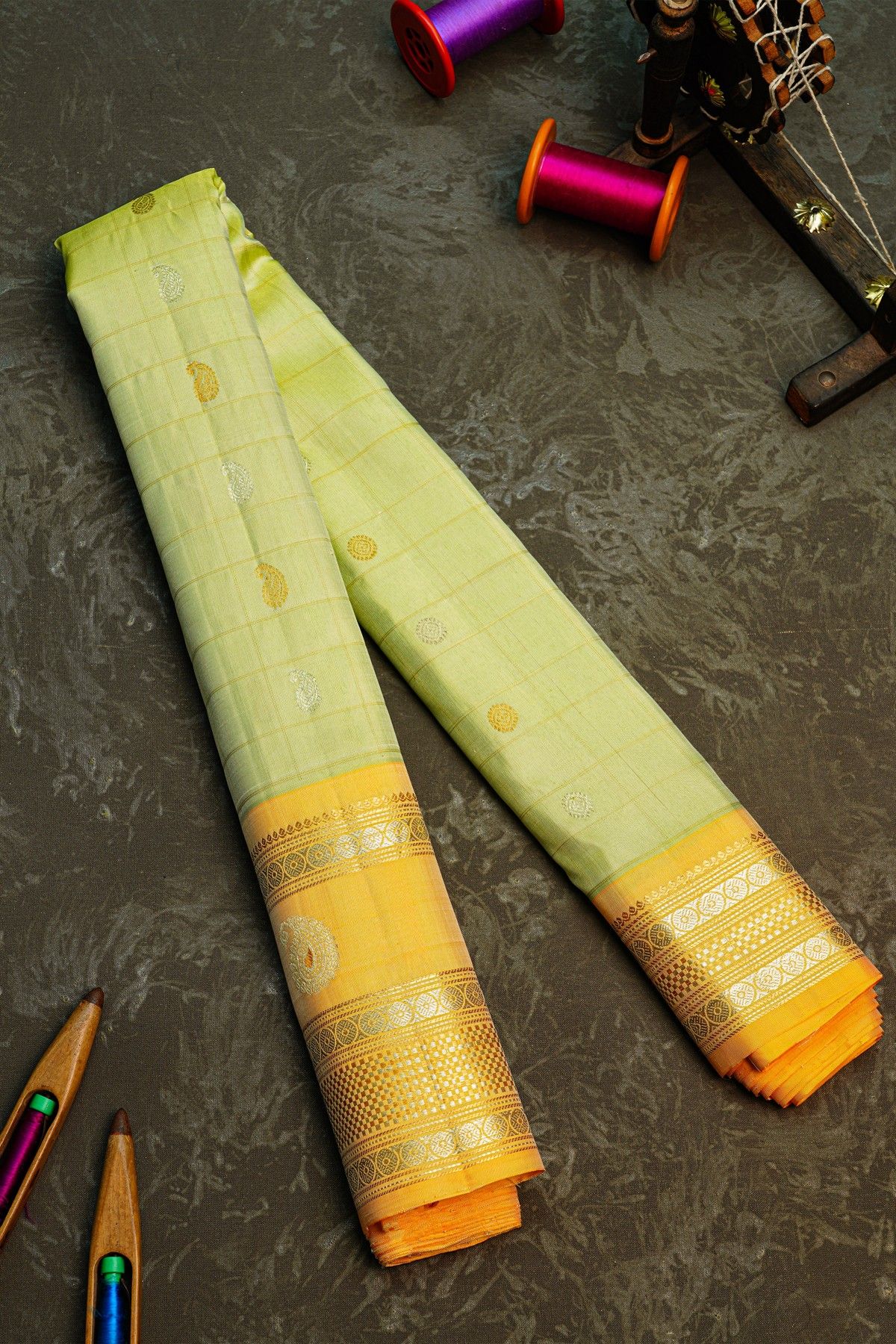 Gadwal Silk Light Green Saree With Gold Buttas And Mustard Gold Zari Border