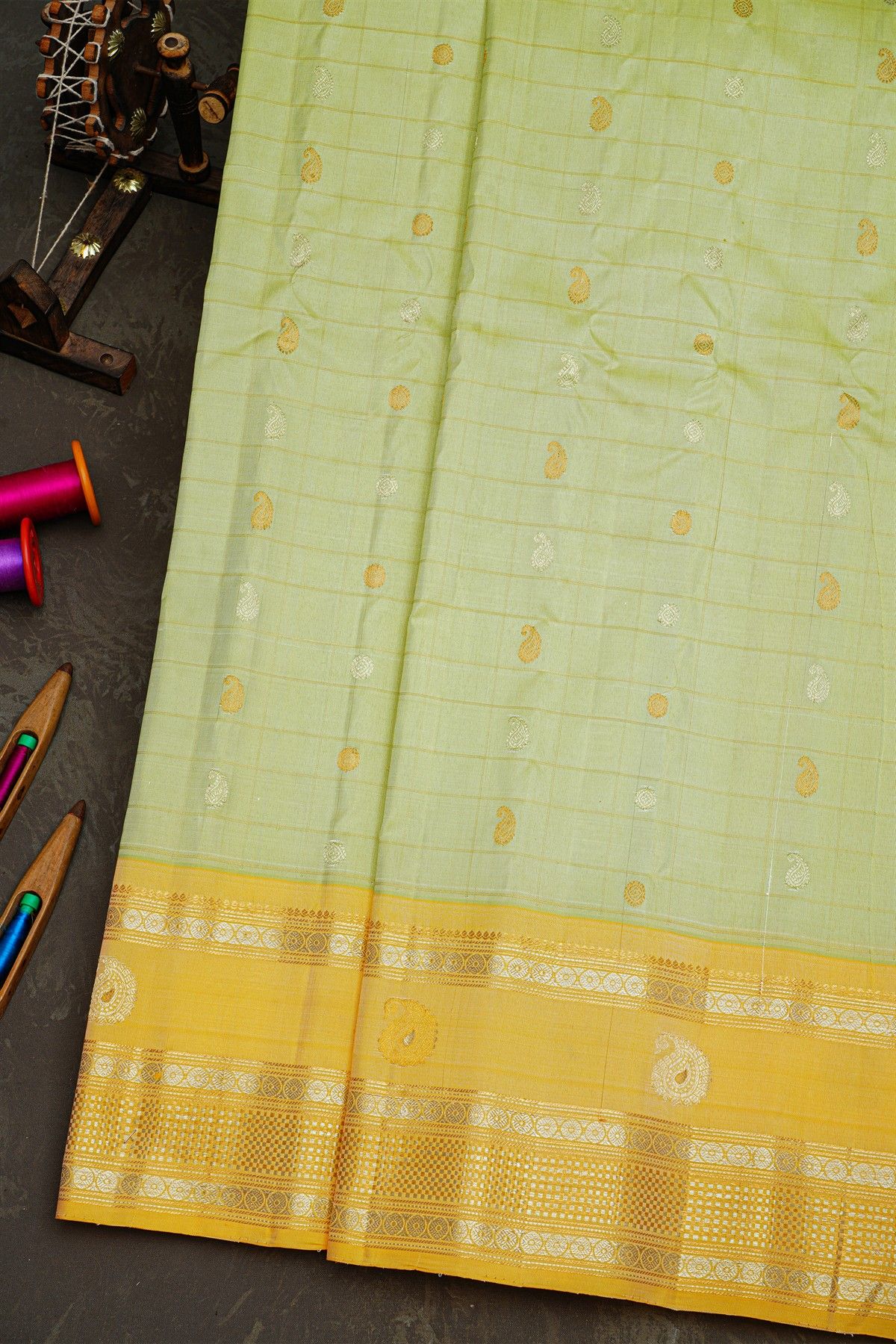 Gadwal Silk Light Green Saree With Gold Buttas And Mustard Gold Zari Border