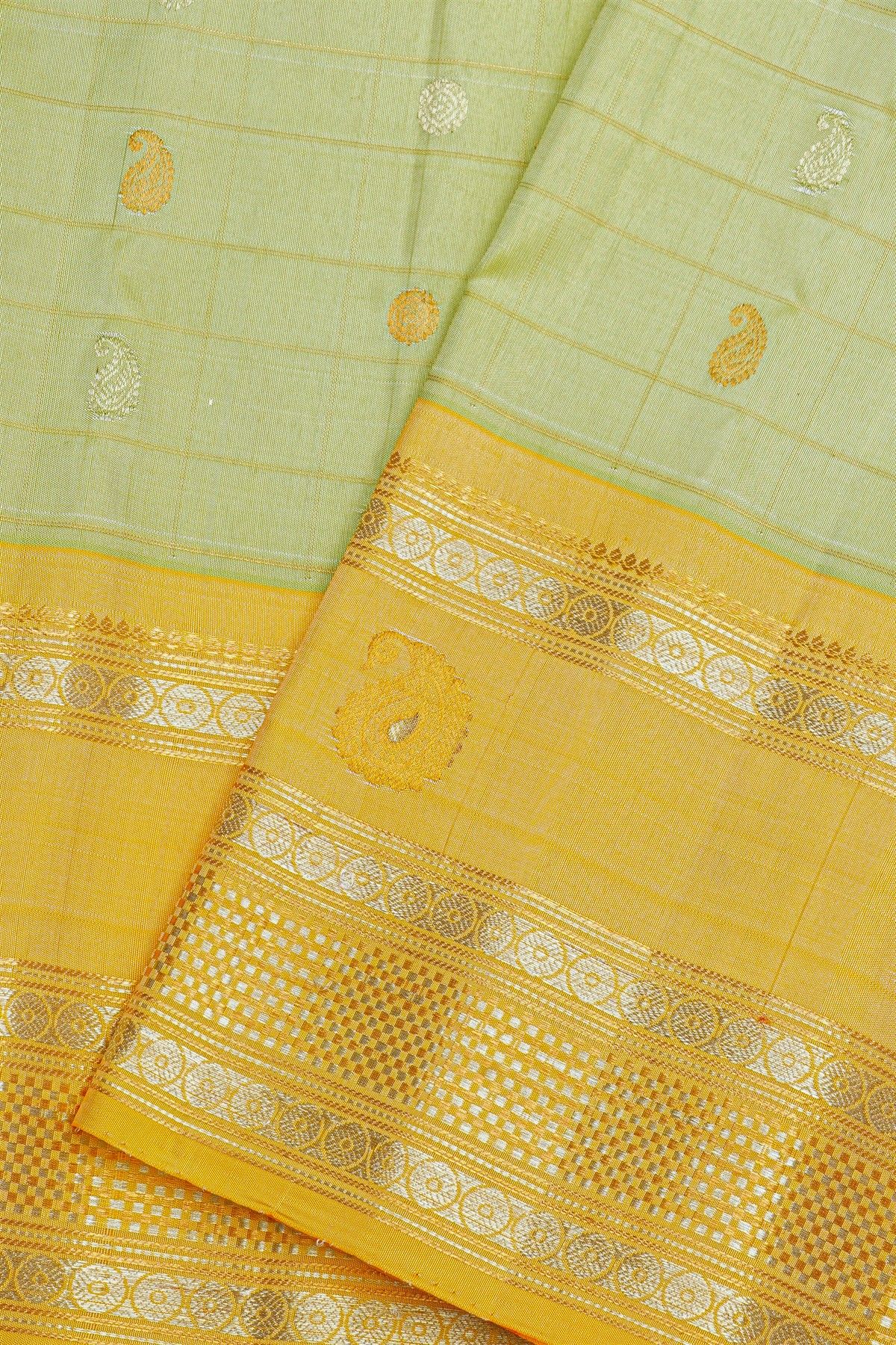 Gadwal Silk Light Green Saree With Gold Buttas And Mustard Gold Zari Border