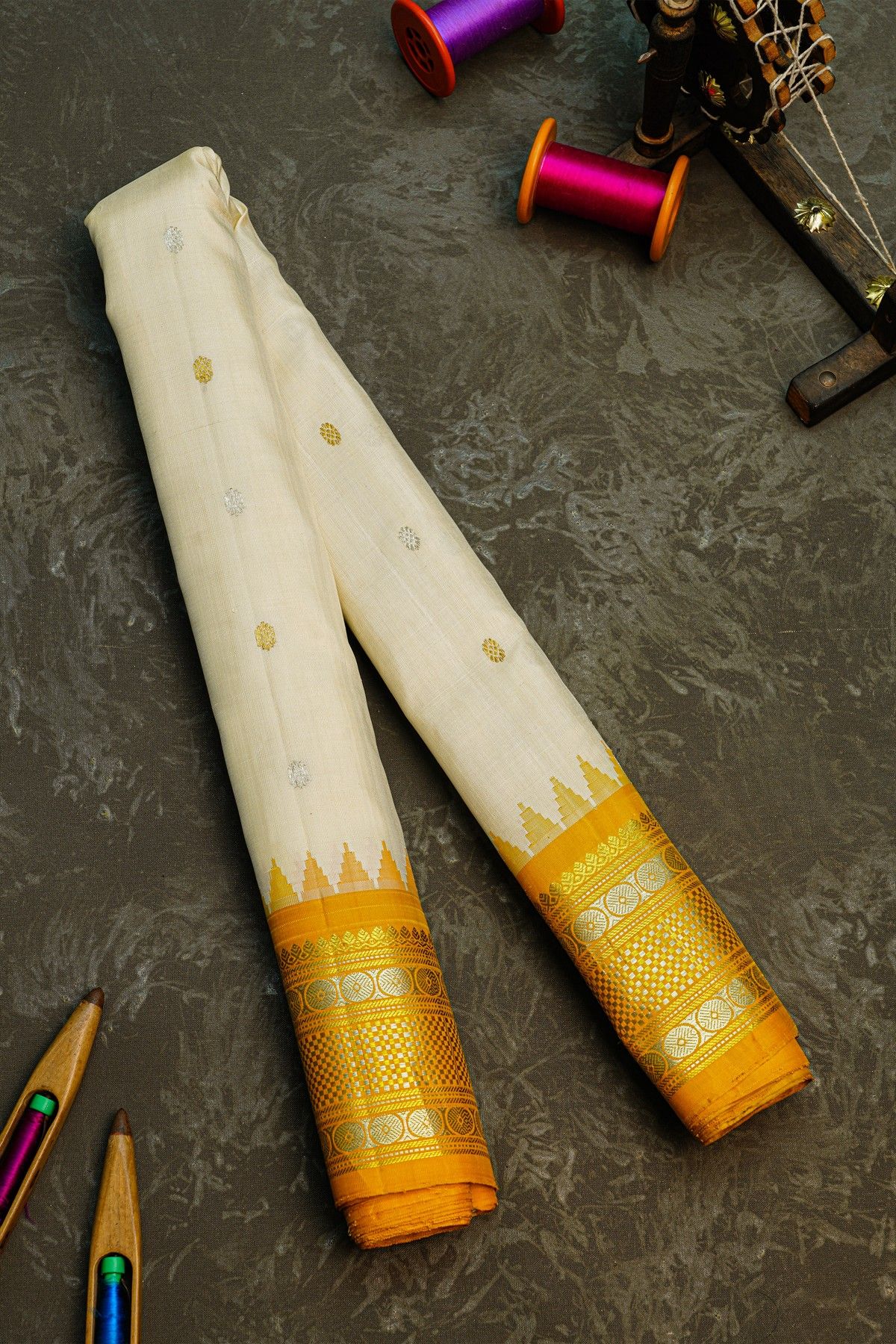 Gadwal Silk Cream Saree With Floral Buttis In Zari Body