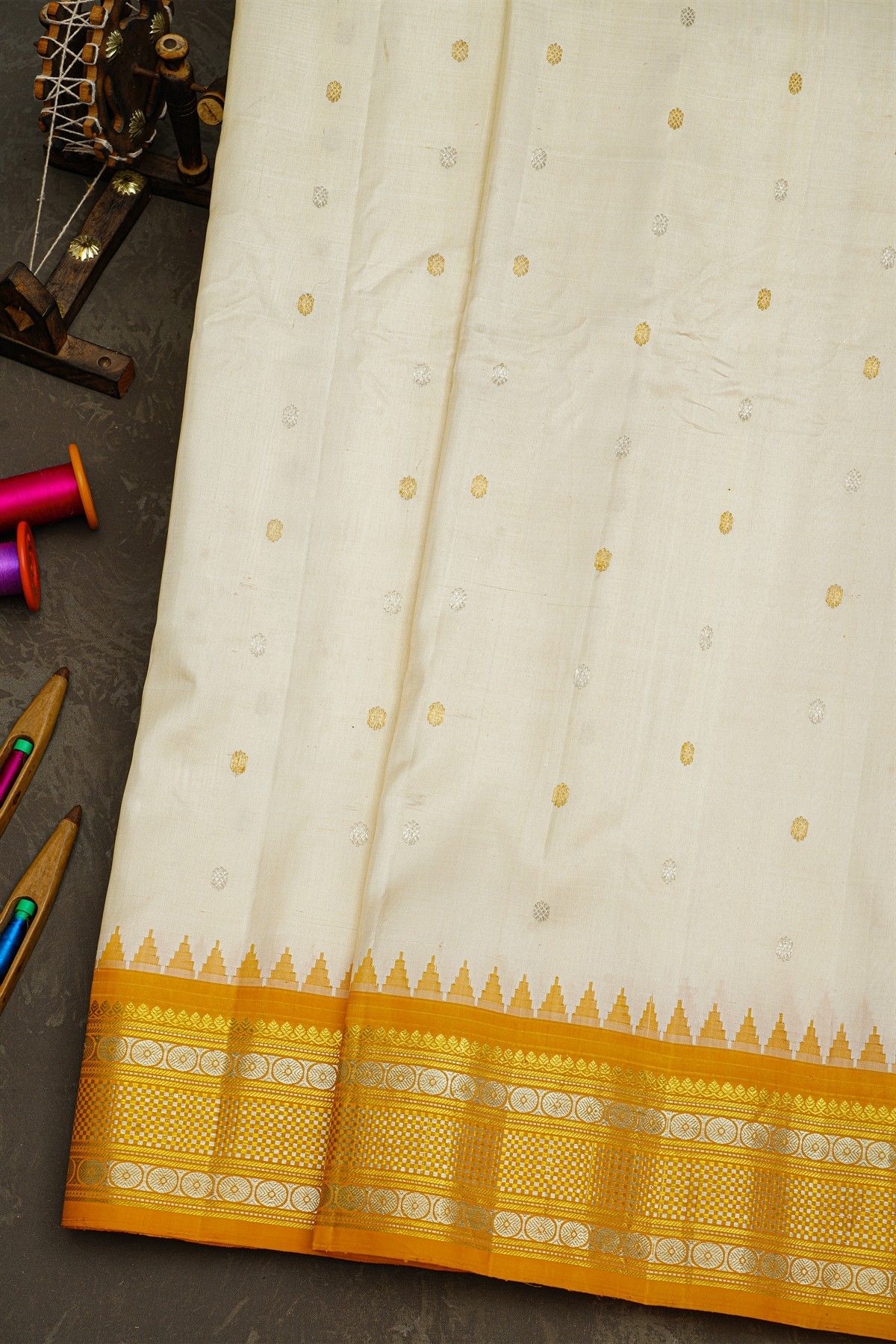 Gadwal Silk Cream Saree With Floral Buttis In Zari Body