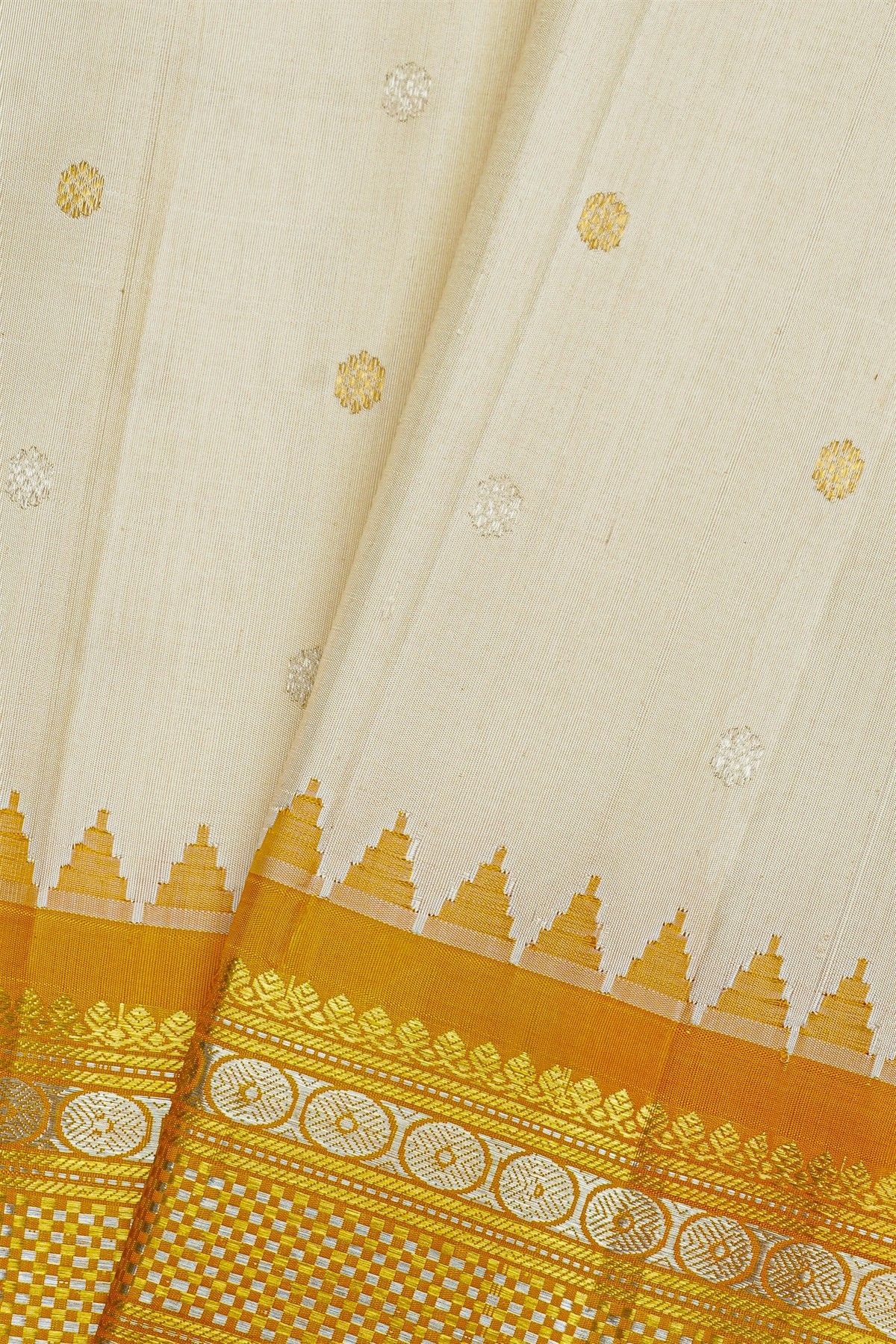 Gadwal Silk Off White Saree With Motifs And Buttis In Zari Body
