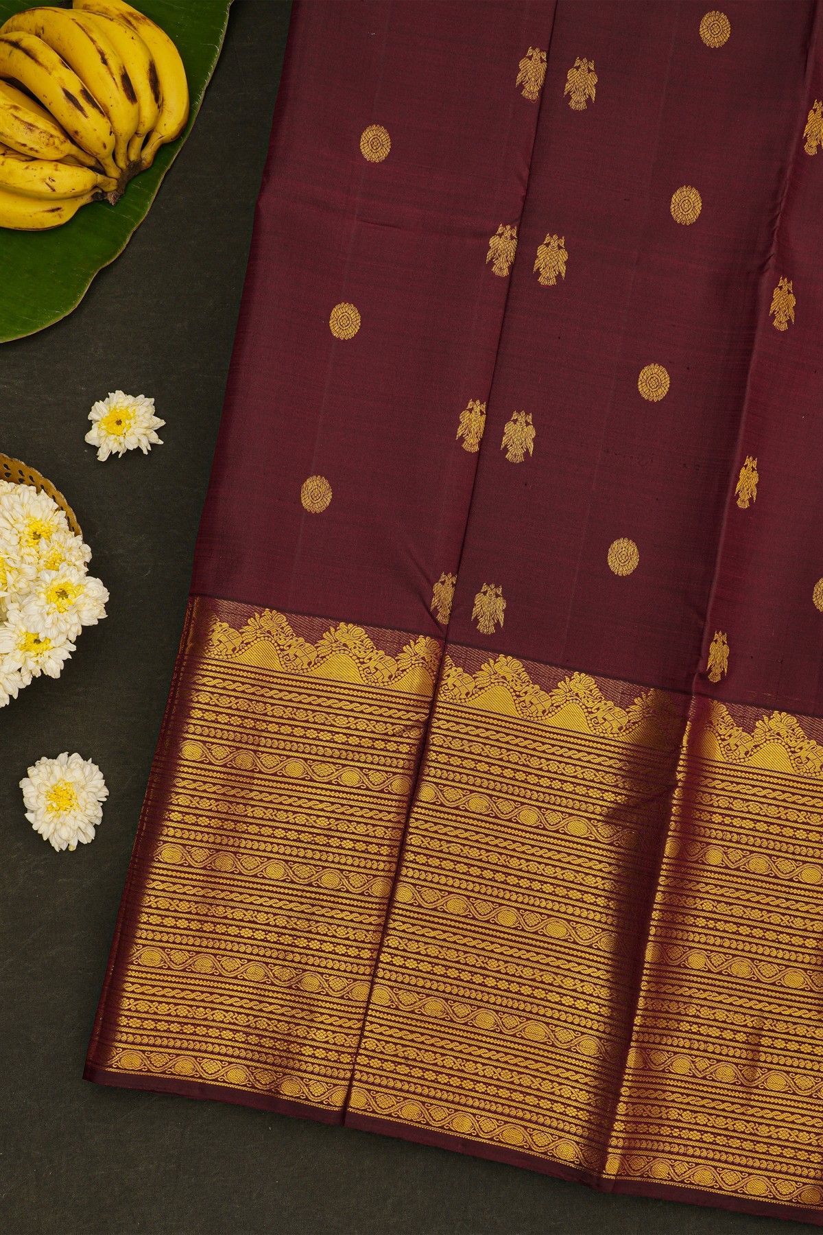 Kancheepuram Silk Wine Saree With Florals And Gandaberunda Buttis Body