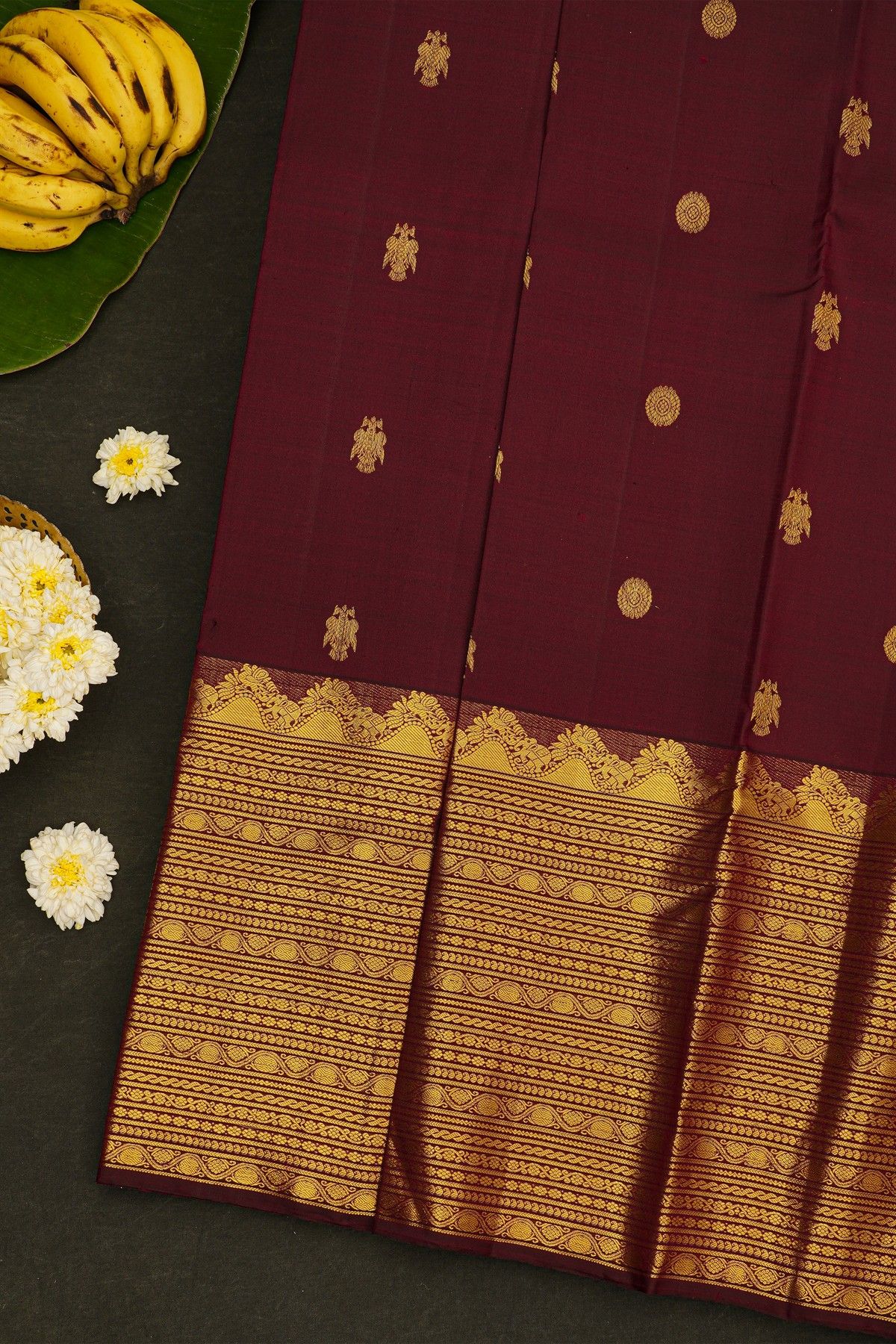 Kancheepuram Silk Dark Wine Colour Saree With Gandaberunda Buttis Body