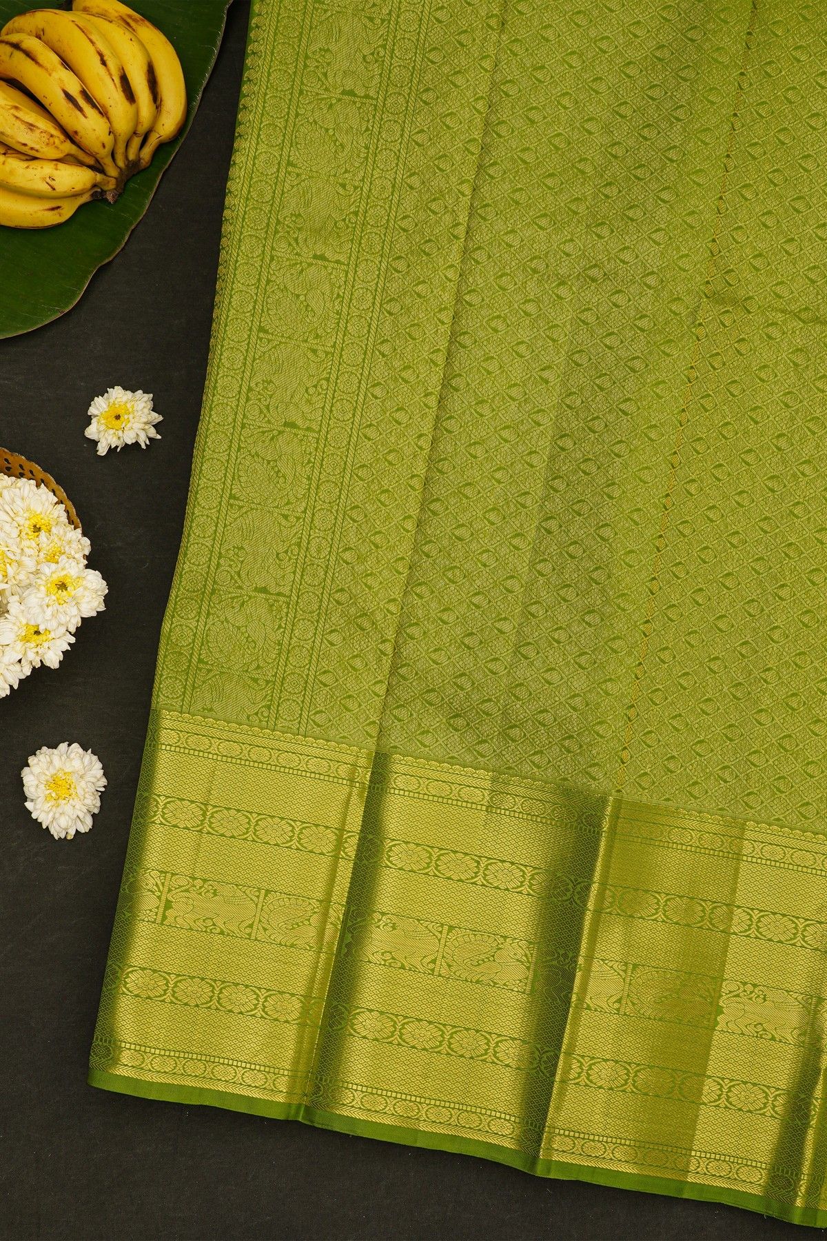 Kancheepuram Silk Parrot Green Saree With Peacock Buttis Body