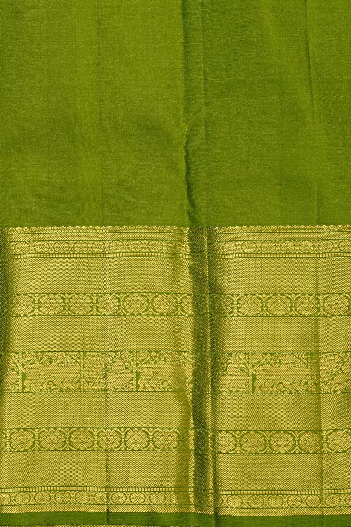 Kancheepuram Silk Parrot Green Saree With Peacock Buttis Body