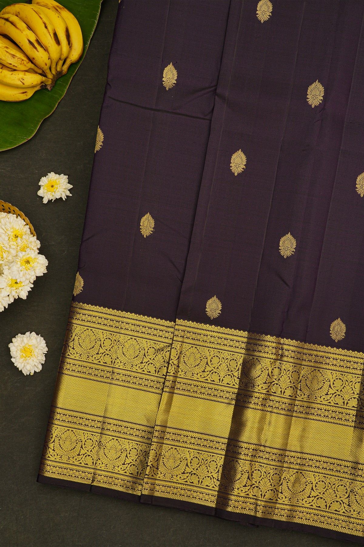 Kancheepuram Silk Black Saree With Floral Buttis Body