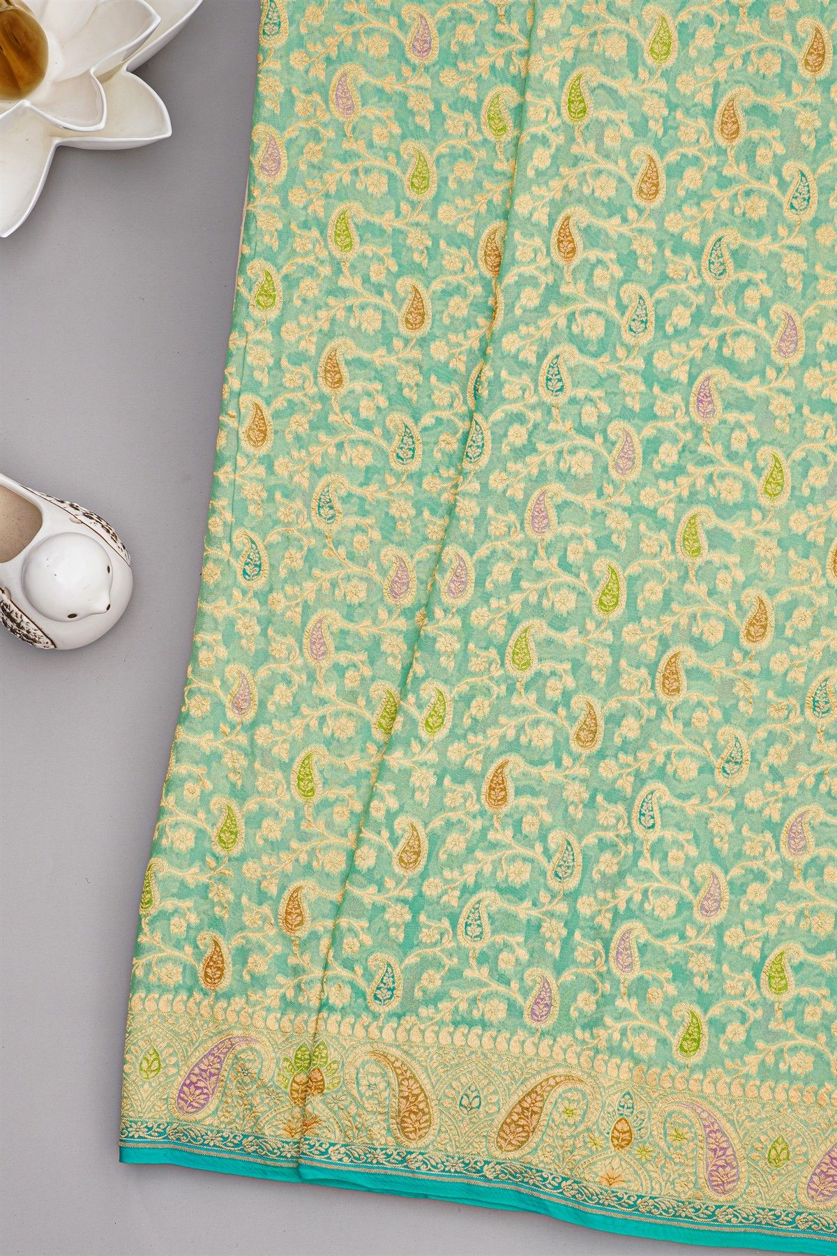 Banarasi Kaddi Georgette Sea Green Saree Florals And Paisleys Border
