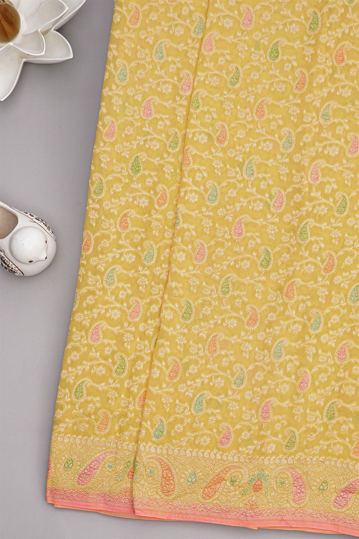 Banarasi Kaddi Georgette Yellow Saree With Florals And Leaves Jaal Border