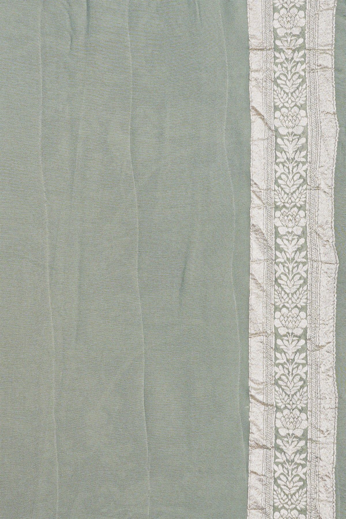 Banarasi Georgette Light Green Saree WIth Florals And Leaves Border