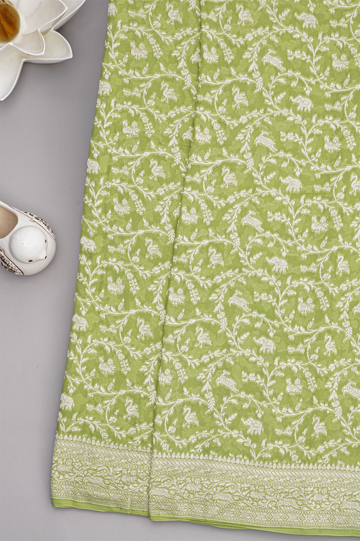 Banarasi Kaddi Georgette Lime Green Saree With With Animals And Birds Border