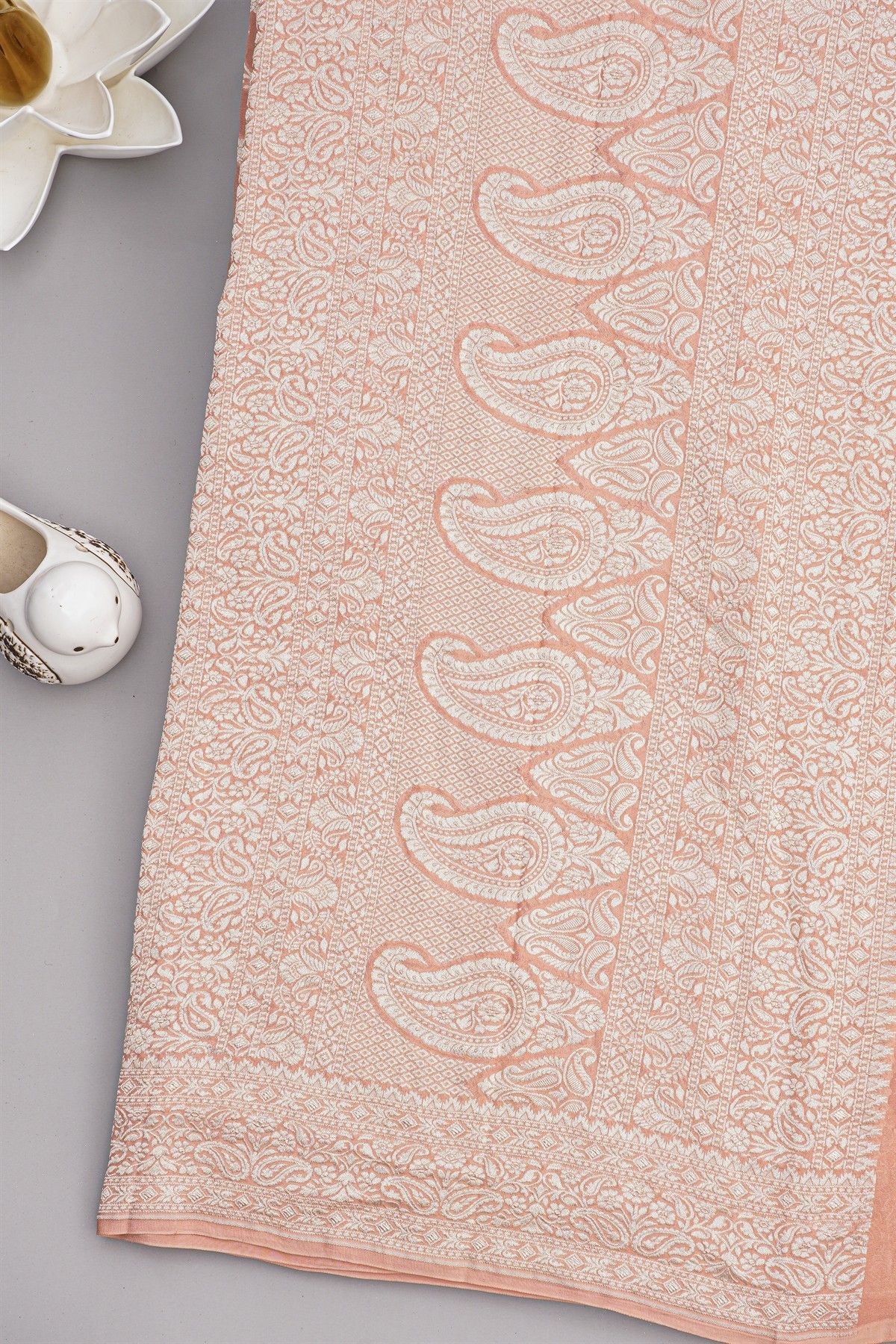 Banarasi Kaddi Georgette Peach Saree WIth Florals And Leaves Border