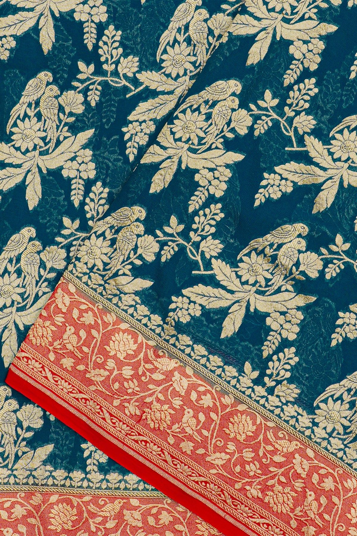 Banarasi Georgette Teal Blue Saree With Florals, Leaves And Parrots Body