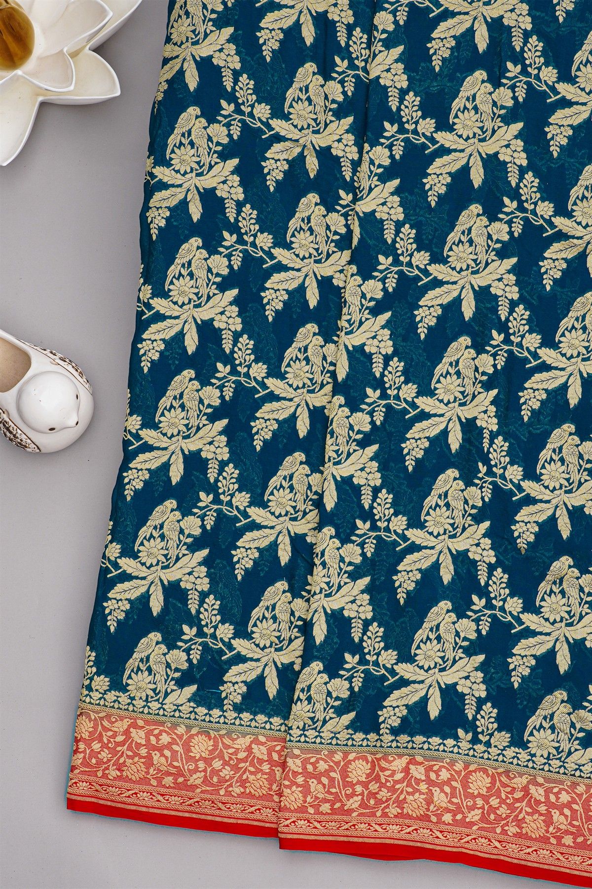 Banarasi Kaddi Georgette Teal Blue Saree With Florals And Parrots Body