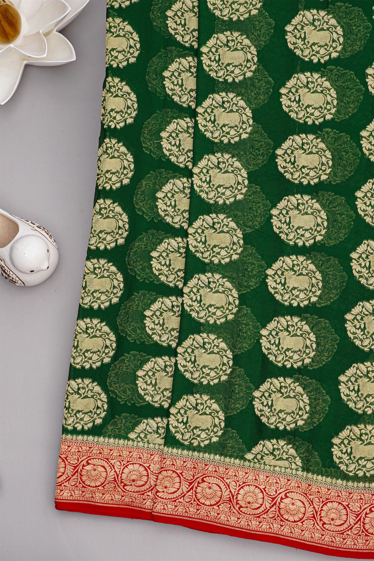 Banarasi Georgette Dark Green Saree With Florals And Leaves With Cows Body
