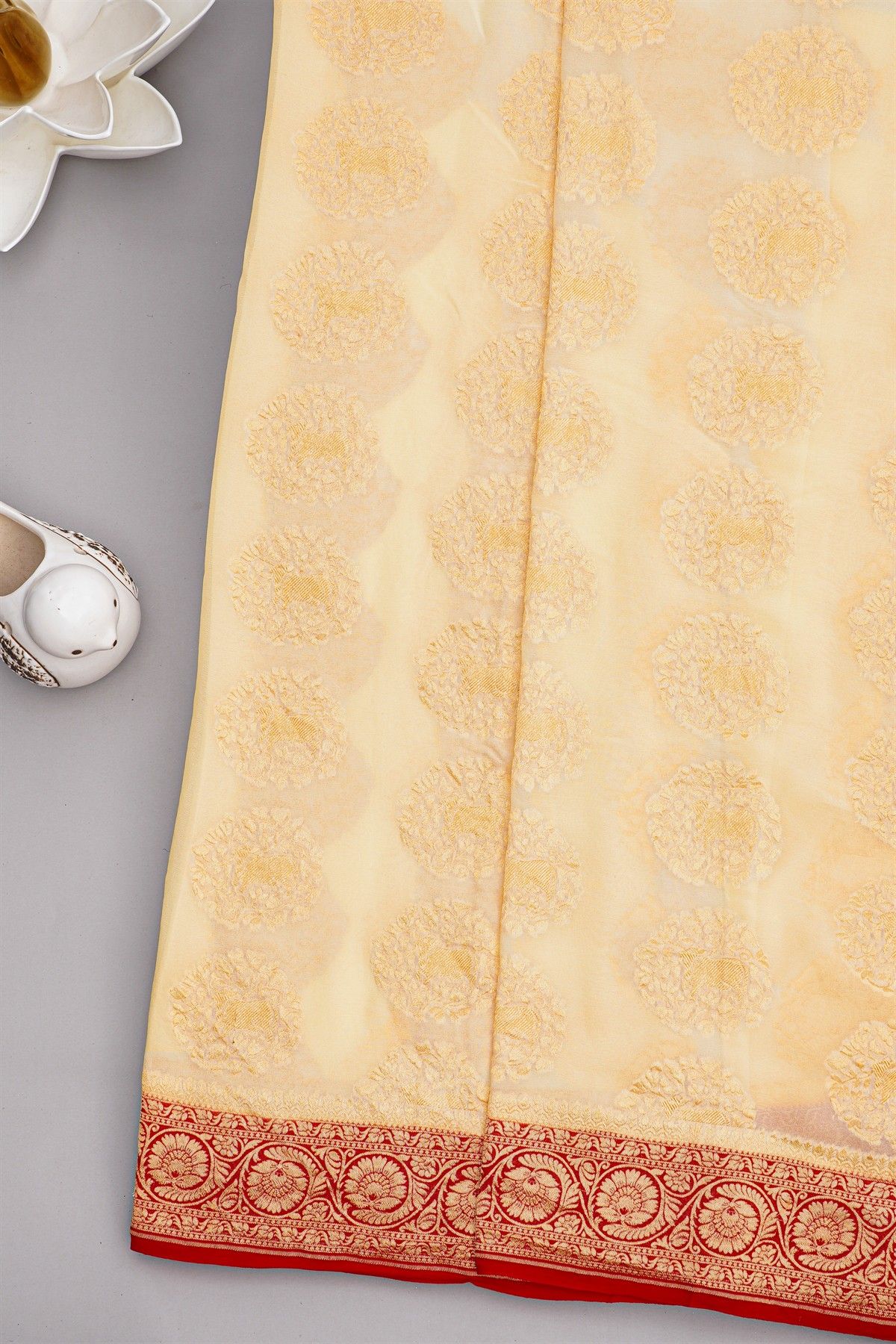 Banarasi Georgette Cream Saree With Florals And Cow Buttis Body
