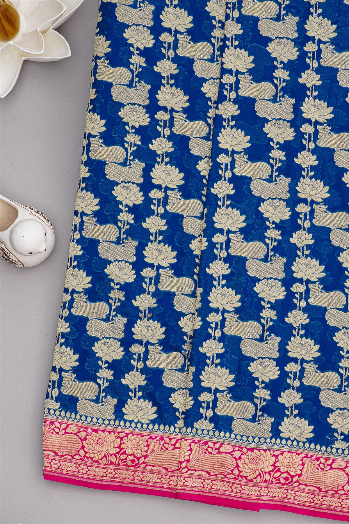 Banarasi Georgette Royal Blue Saree With Florals And Leaves With Cows Body