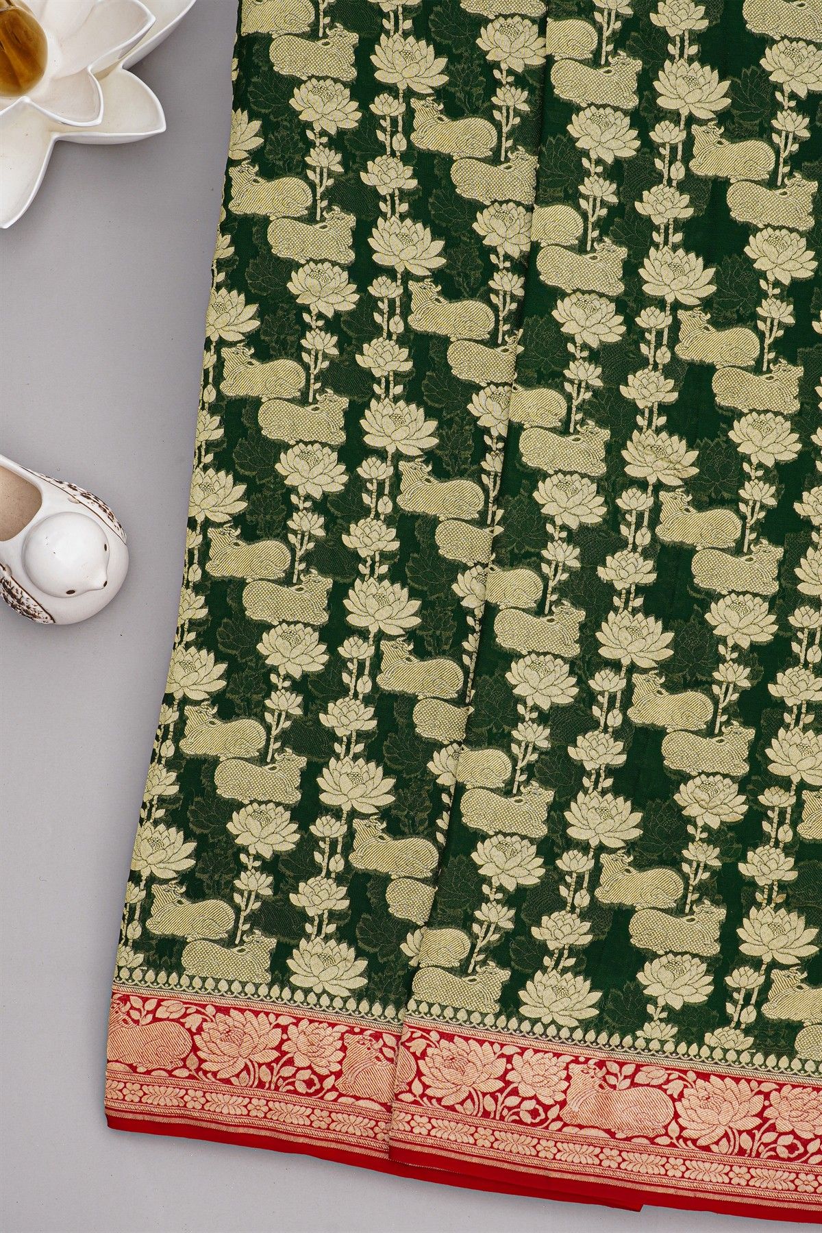 Banarasi Georgette Bottle Green Saree With Florals And Leaves With Cows Body