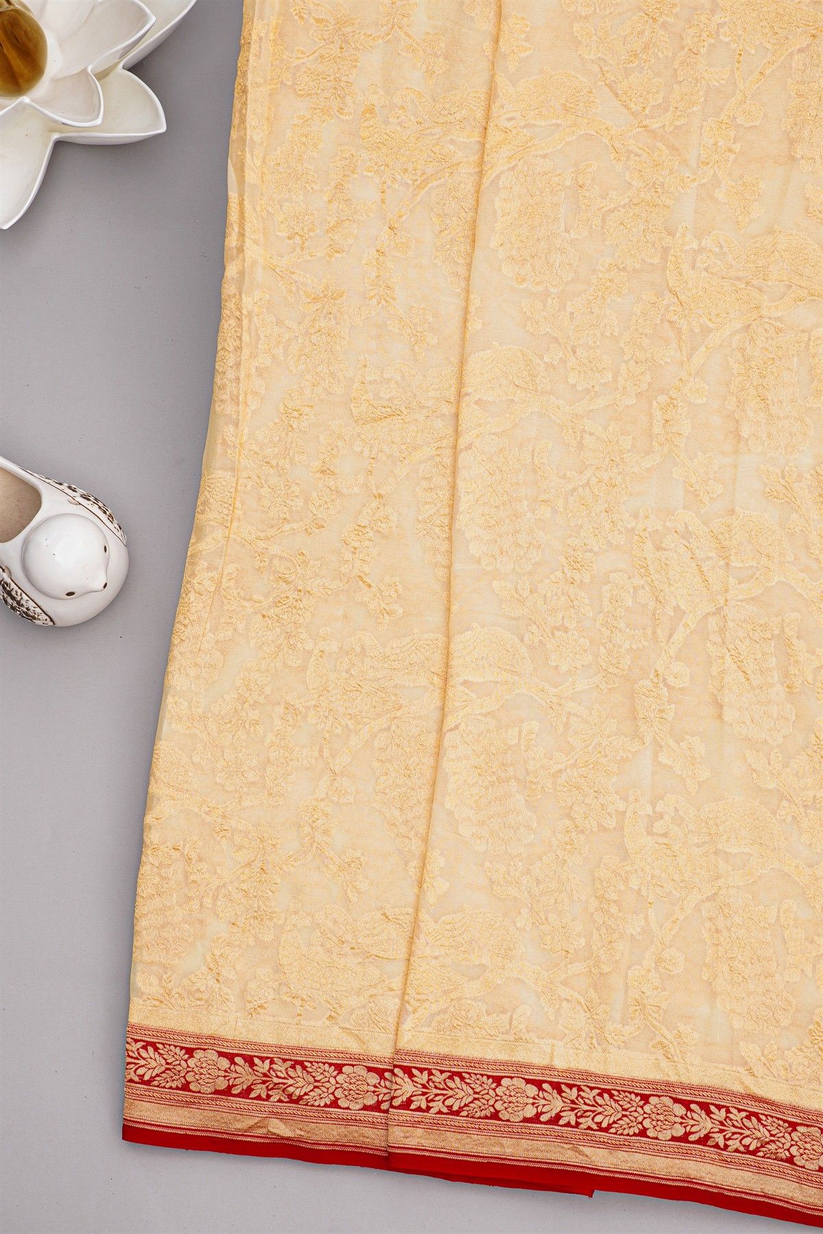 Banarasi Georgette Cream Saree With Florals And Peacocks Body