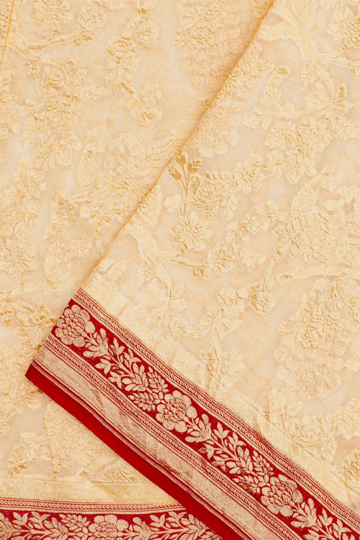 Banarasi Georgette Cream Saree With Florals And Peacocks Body