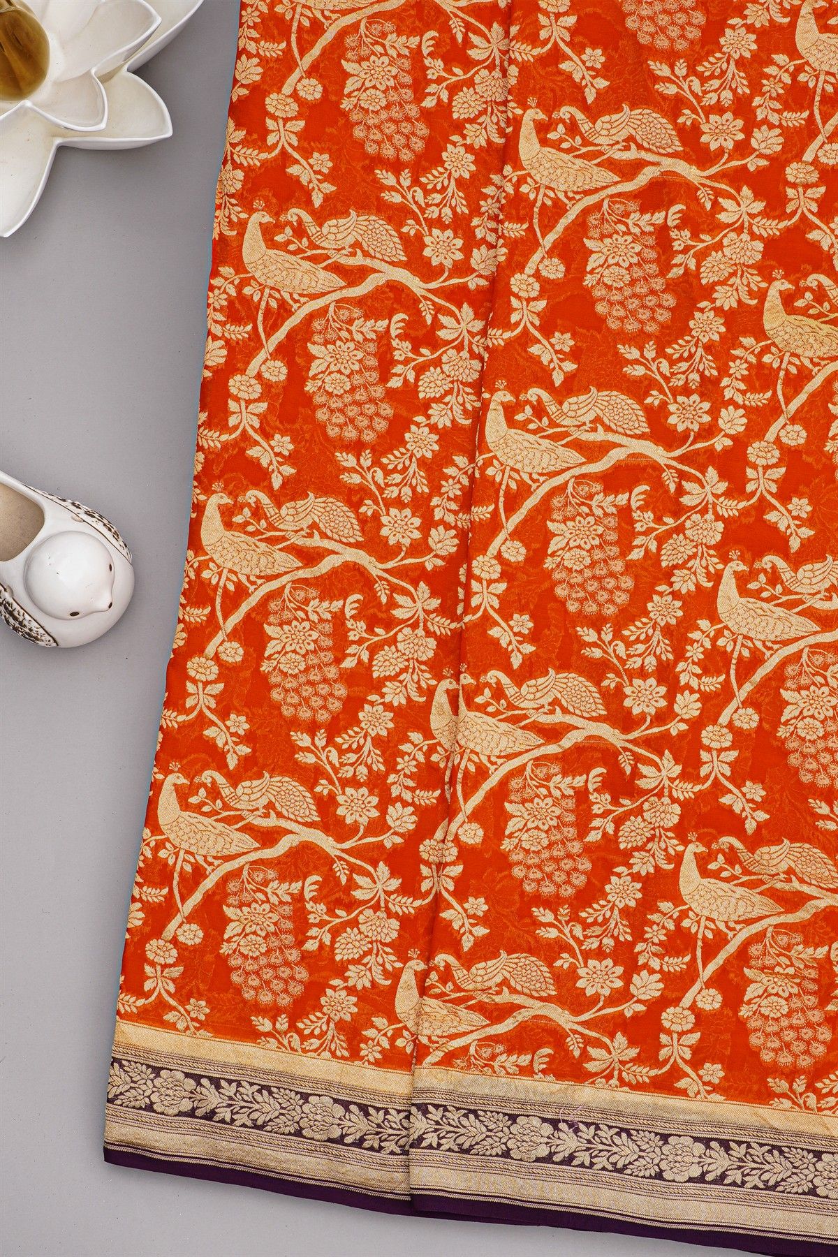 Banarasi Georgette Orange Saree With Florals And Leaves Border