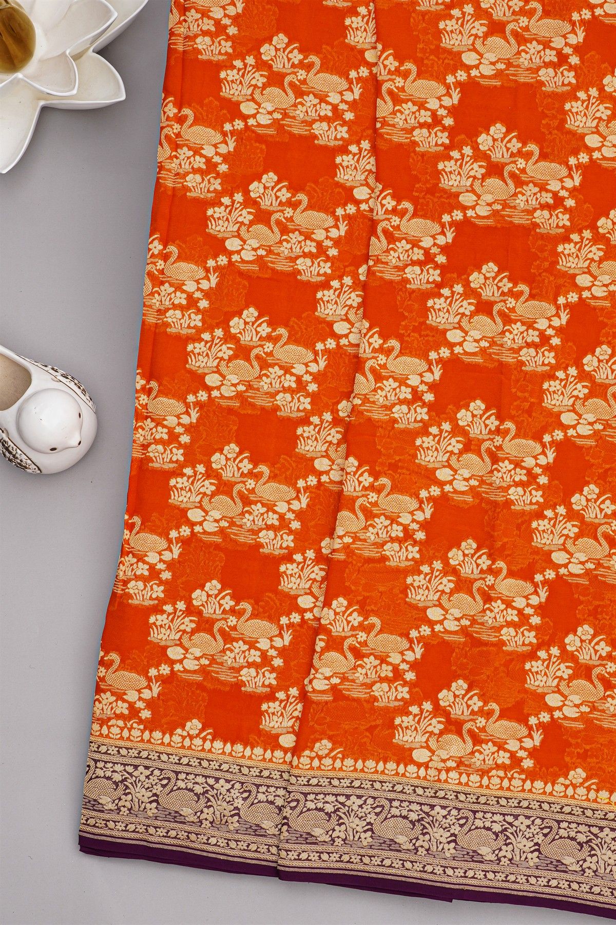 Banarasi Kaddi Georgette Orange Saree With Florals And Swans Border