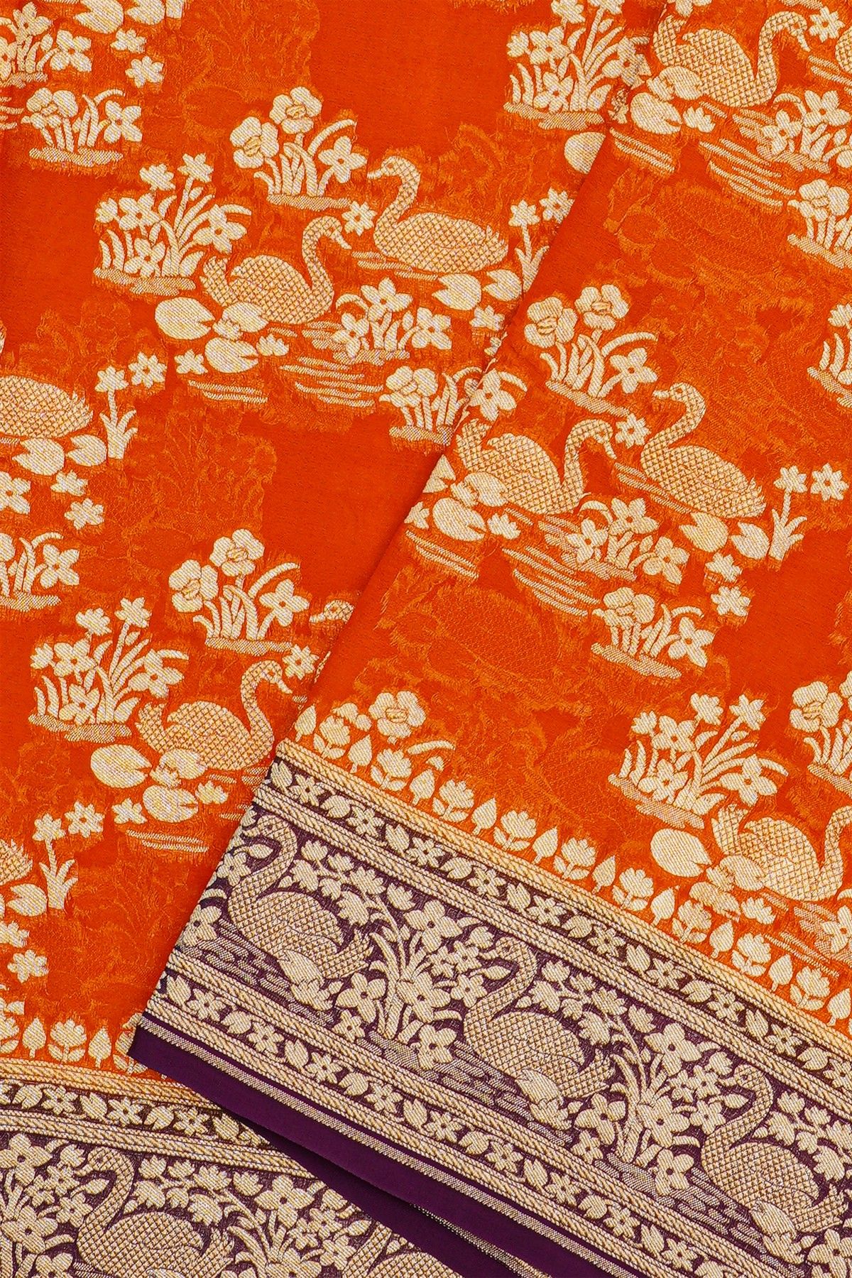 Banarasi Kaddi Georgette Orange Saree With Florals And Swans Border