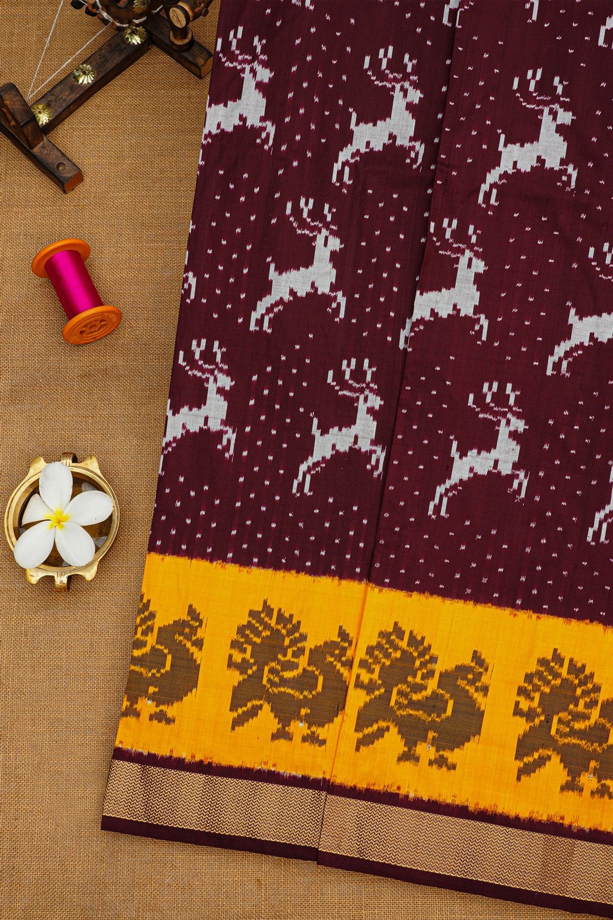 Ikat Silk Maroon Saree With Deer Buttis Body