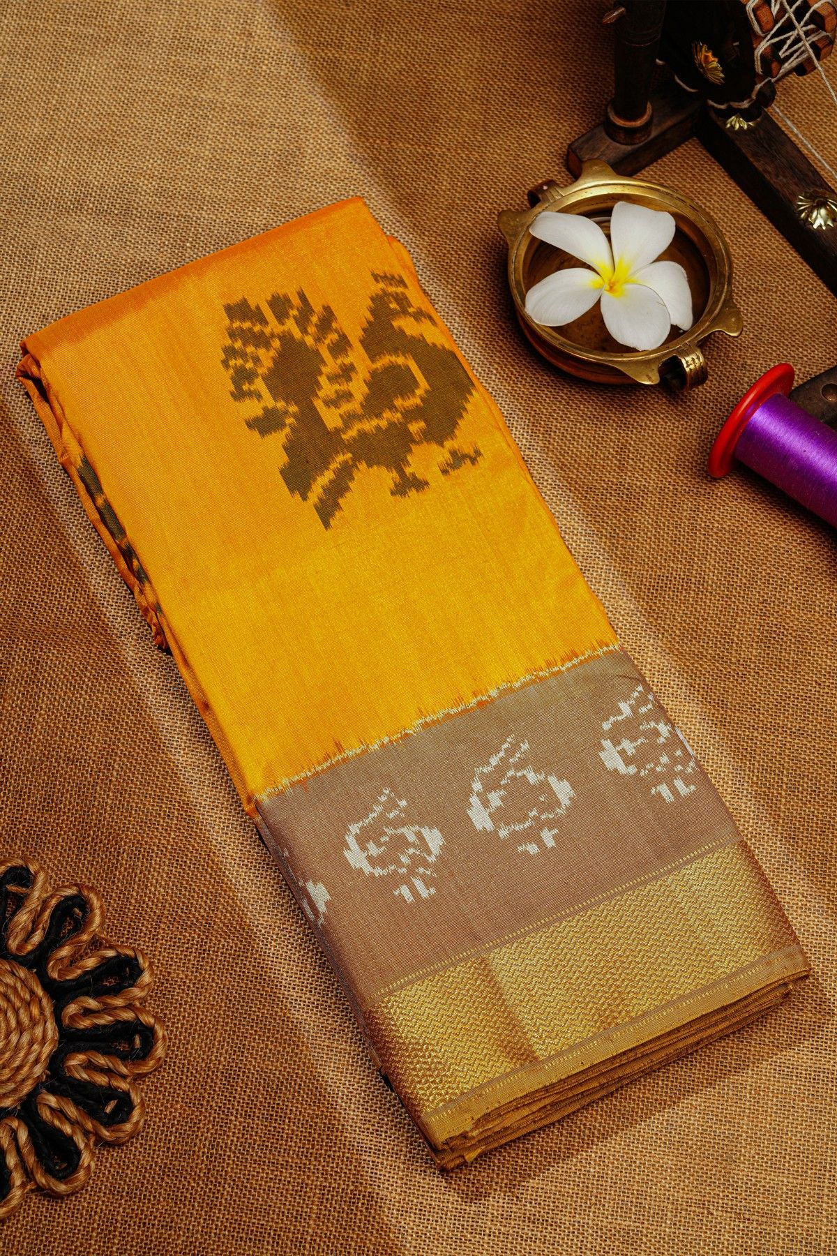Ikat Silk Yellow Saree With Peacock Buttis Body