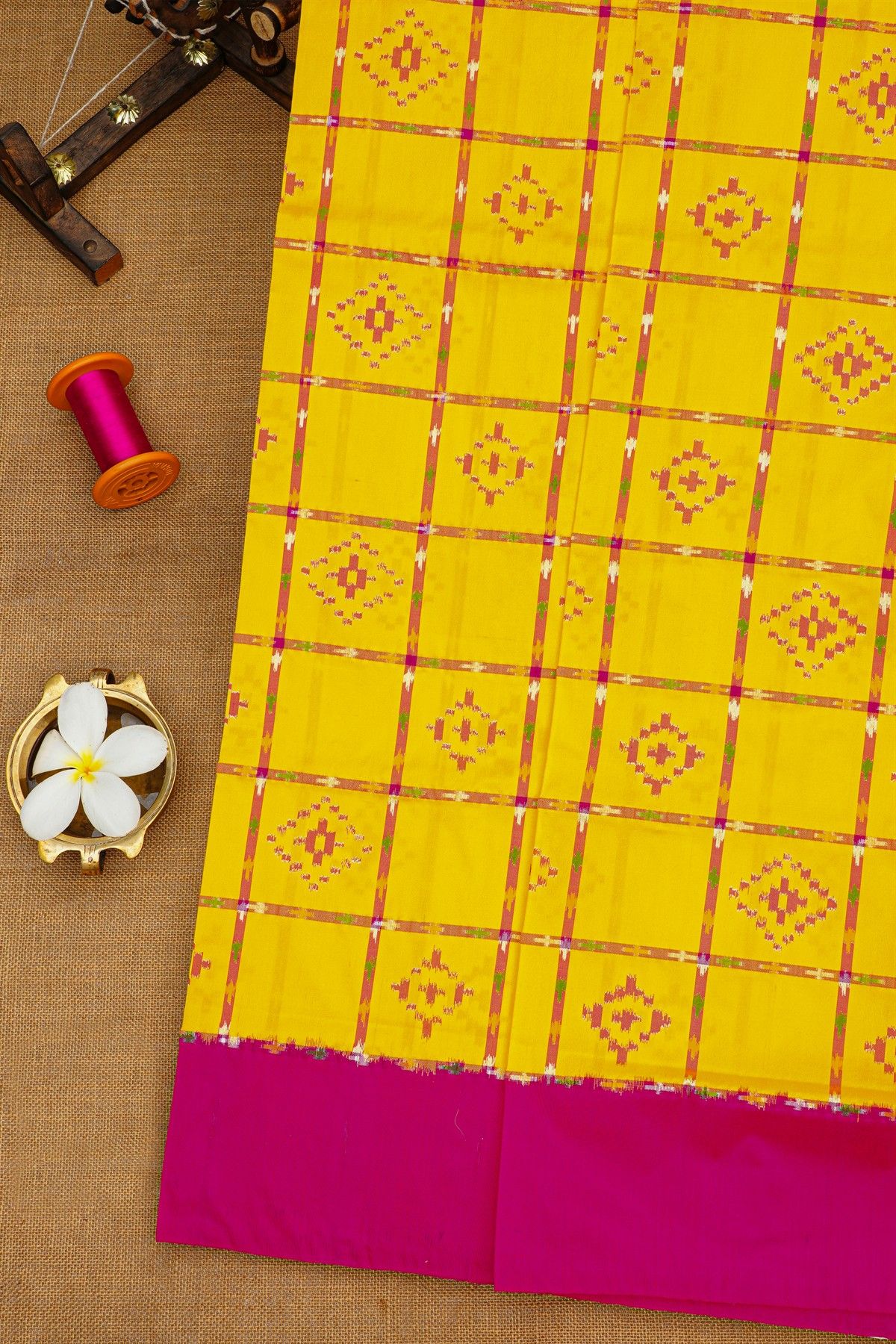 Ikat Silk Yellow Saree With Checks And Florals Body