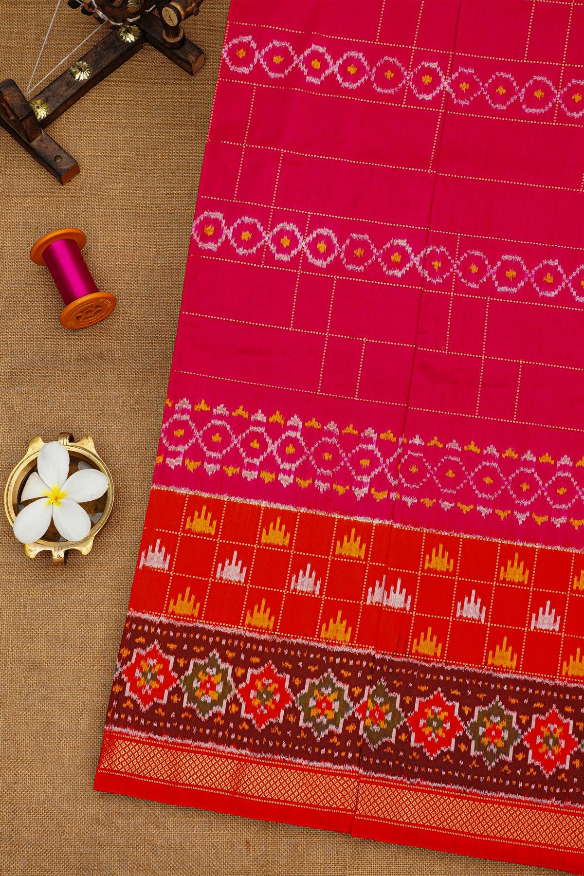 Ikat Silk Rani Pink Saree With Checks And Floral Jaal Body