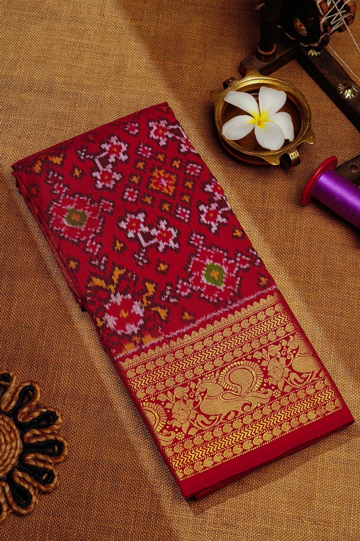 Ikat Silk Maroon Saree With Florals And Leaves Body