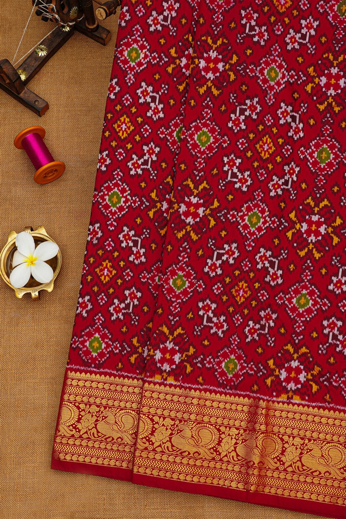 Ikat Silk Maroon Saree With Florals And Leaves Body