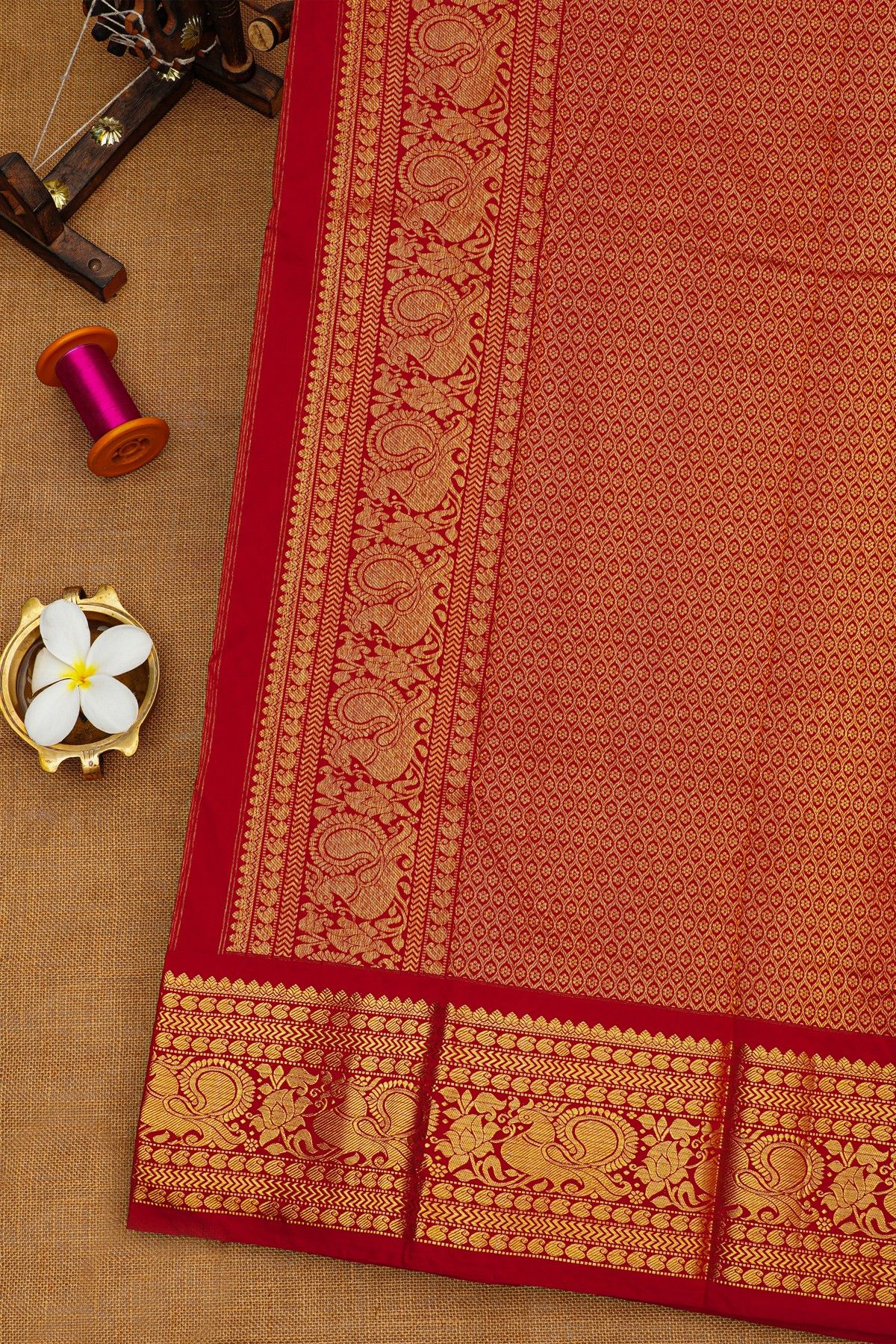Ikat Silk Maroon Saree With Florals And Leaves Body