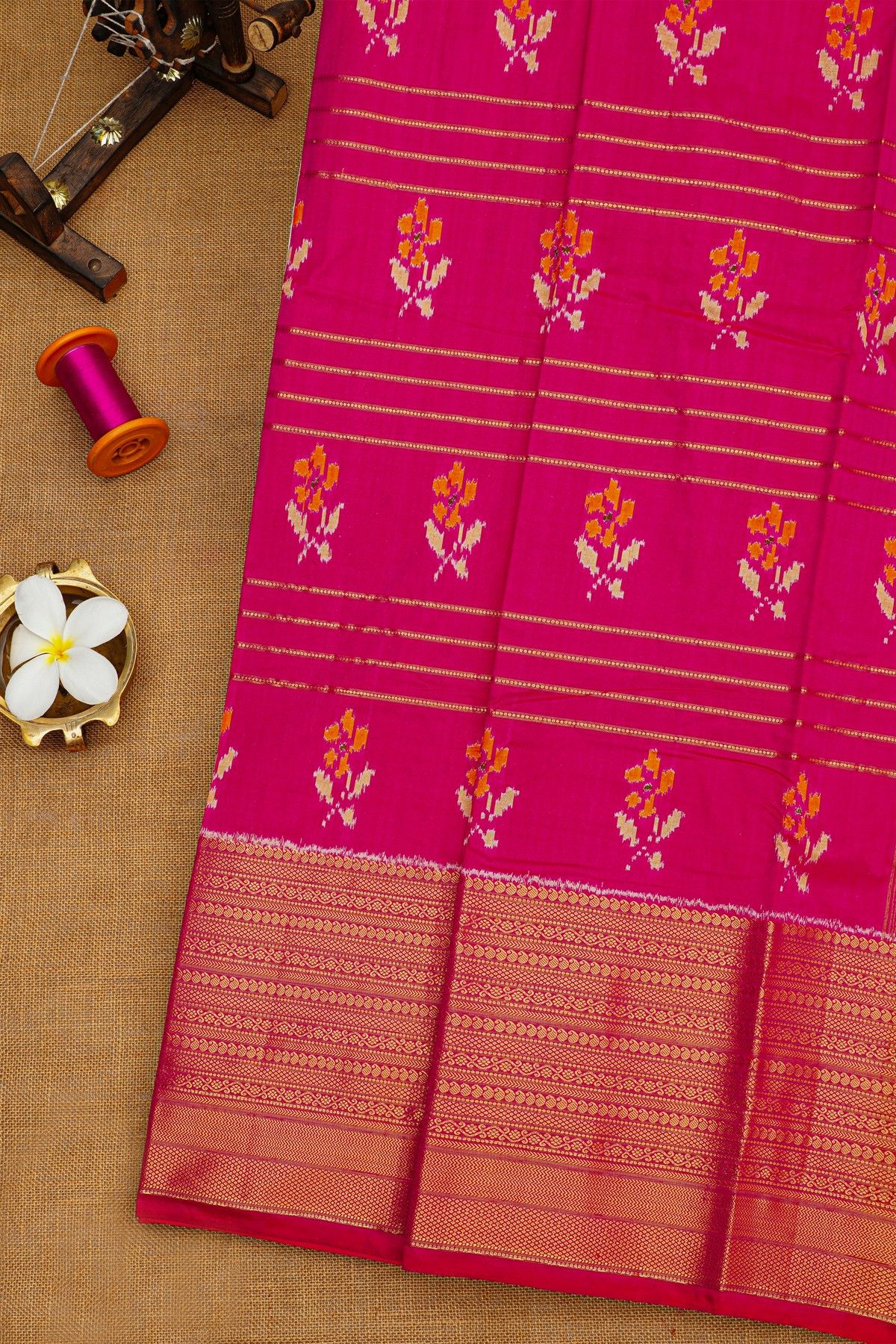 Ikat Silk Magenta Saree With Zari Lines And Florals Body