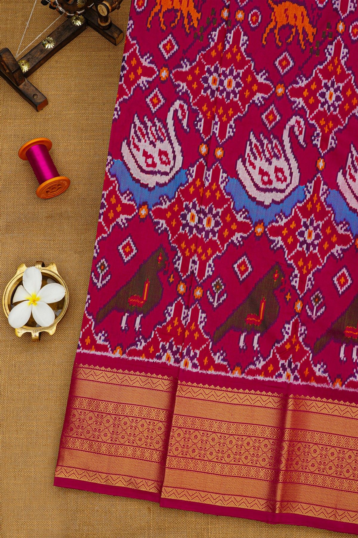 Ikat Silk Magenta Saree With Florals With Swans And Parrots Body