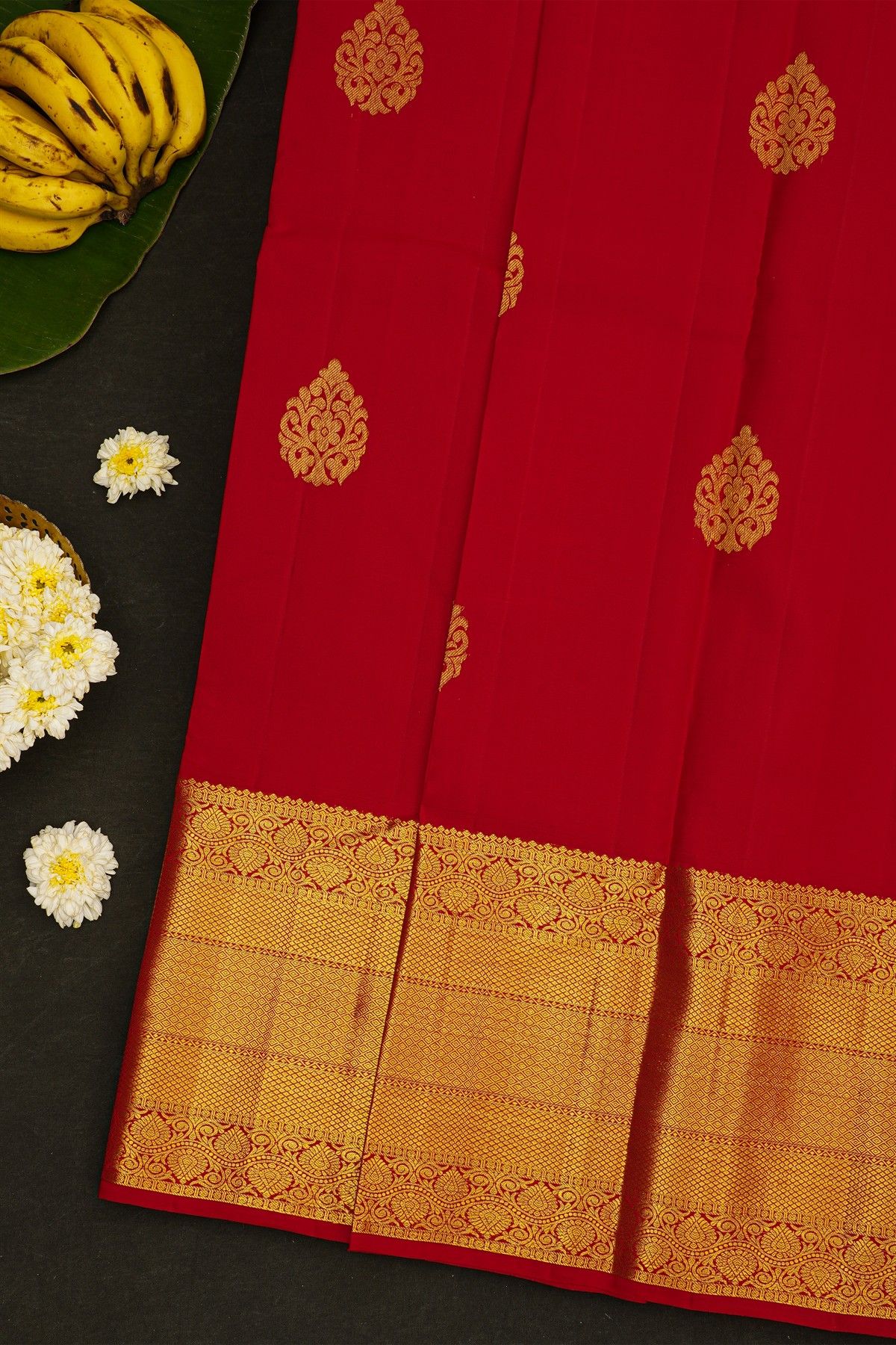Kancheepuram Silk Red Saree With Florals And Diamonds In Zari Border