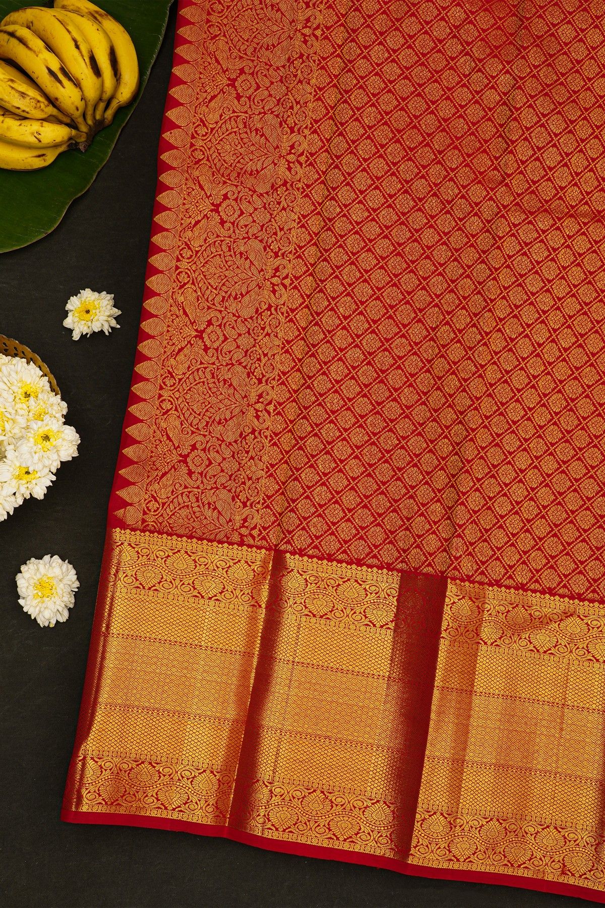 Kancheepuram Silk Red Saree With Florals And Diamonds In Zari Border