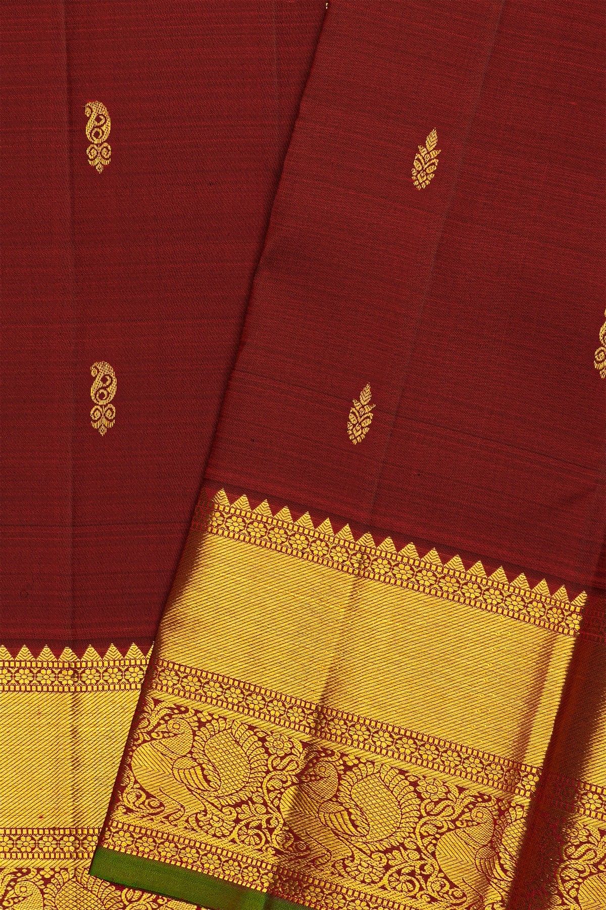 Kancheepuram Silk Maroon Saree With Cross Lines In Zari With Peacocks Border