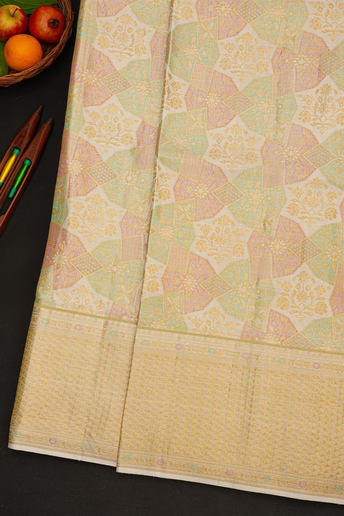 Kancheepuram Silk Off White Saree With Triangle-Shaped Gold Zari Border