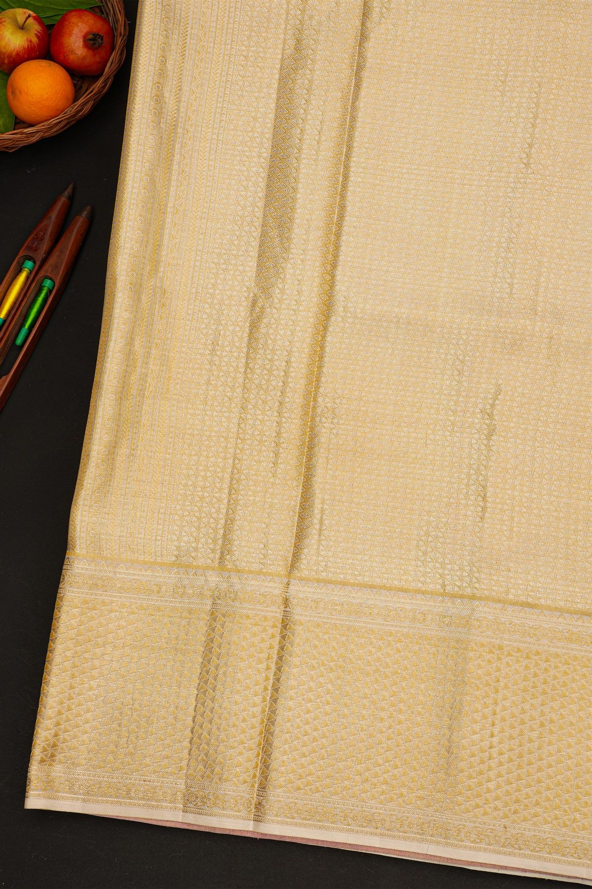 Kancheepuram Silk Off White Saree With Triangle-Shaped Gold Zari Border