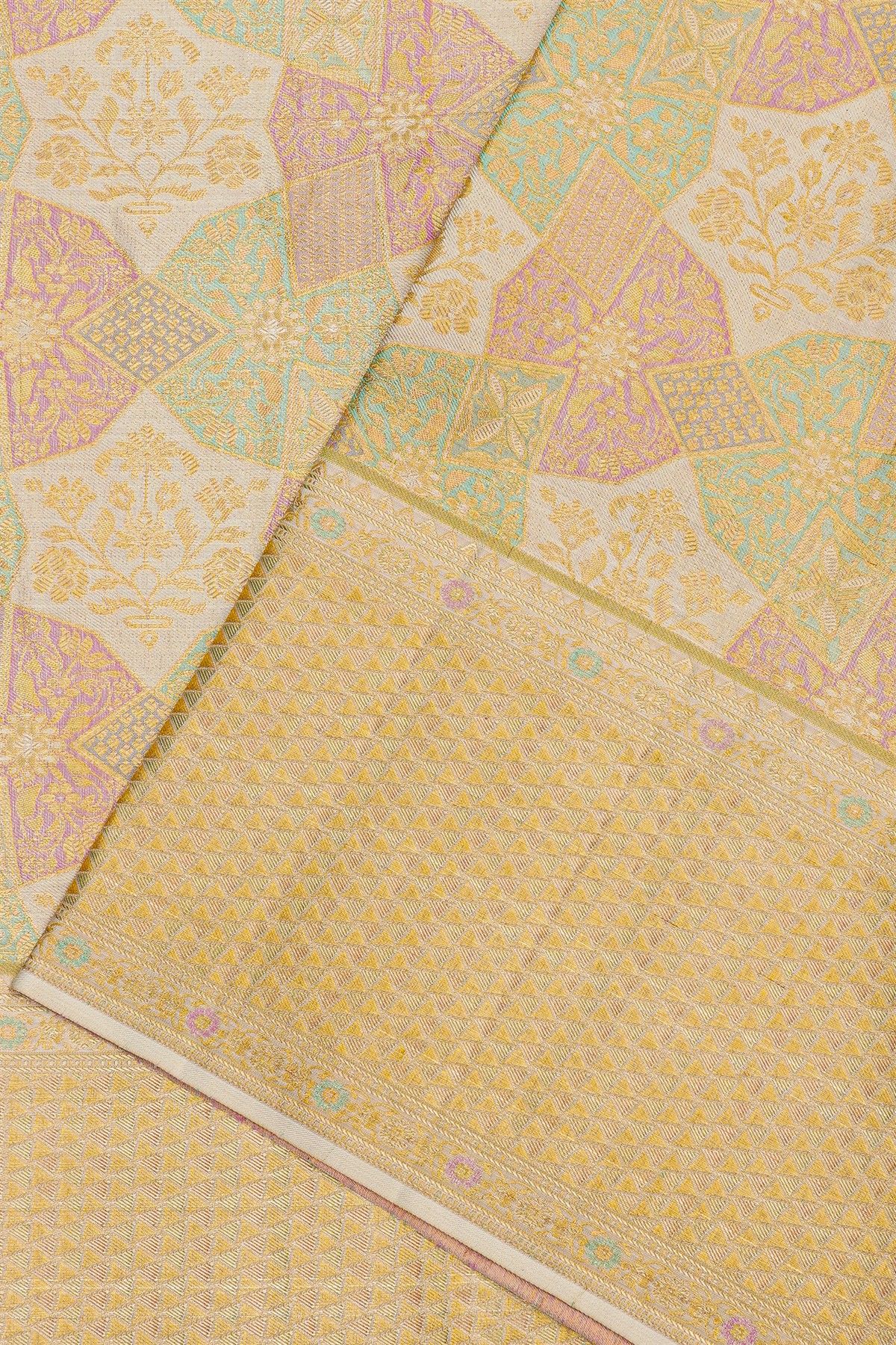 Kancheepuram Silk Off White Saree With Triangle-Shaped Gold Zari Border