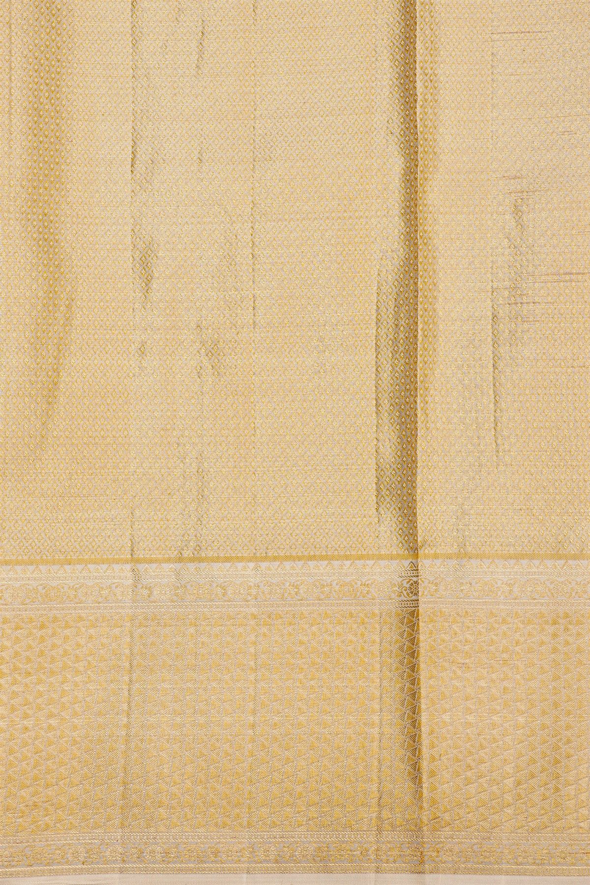 Kancheepuram Silk Off White Saree With Triangle-Shaped Gold Zari Border