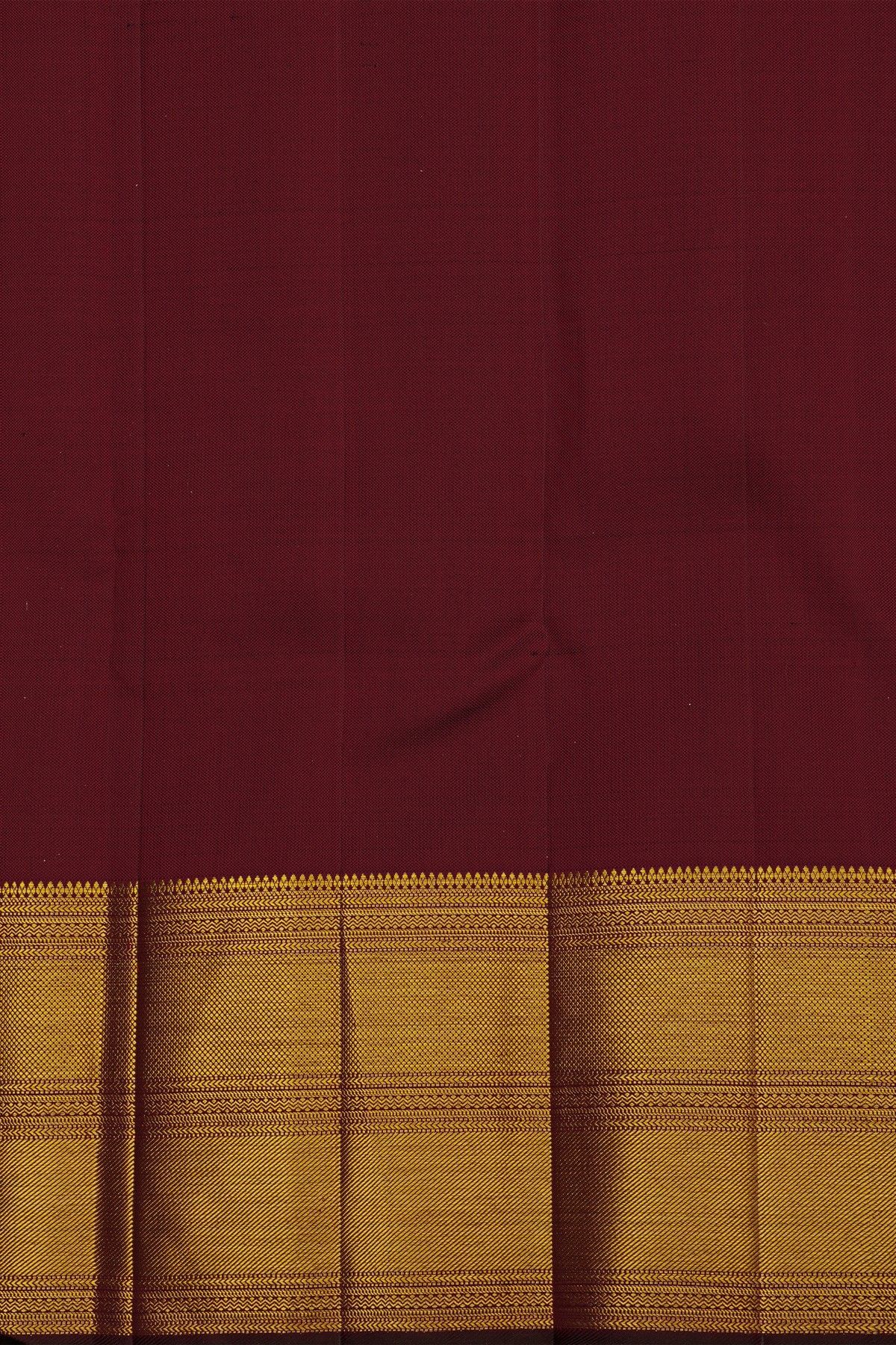 Kancheepuram Silk Dark Wine Saree With Diamonds And Cross Lines In Zari Border