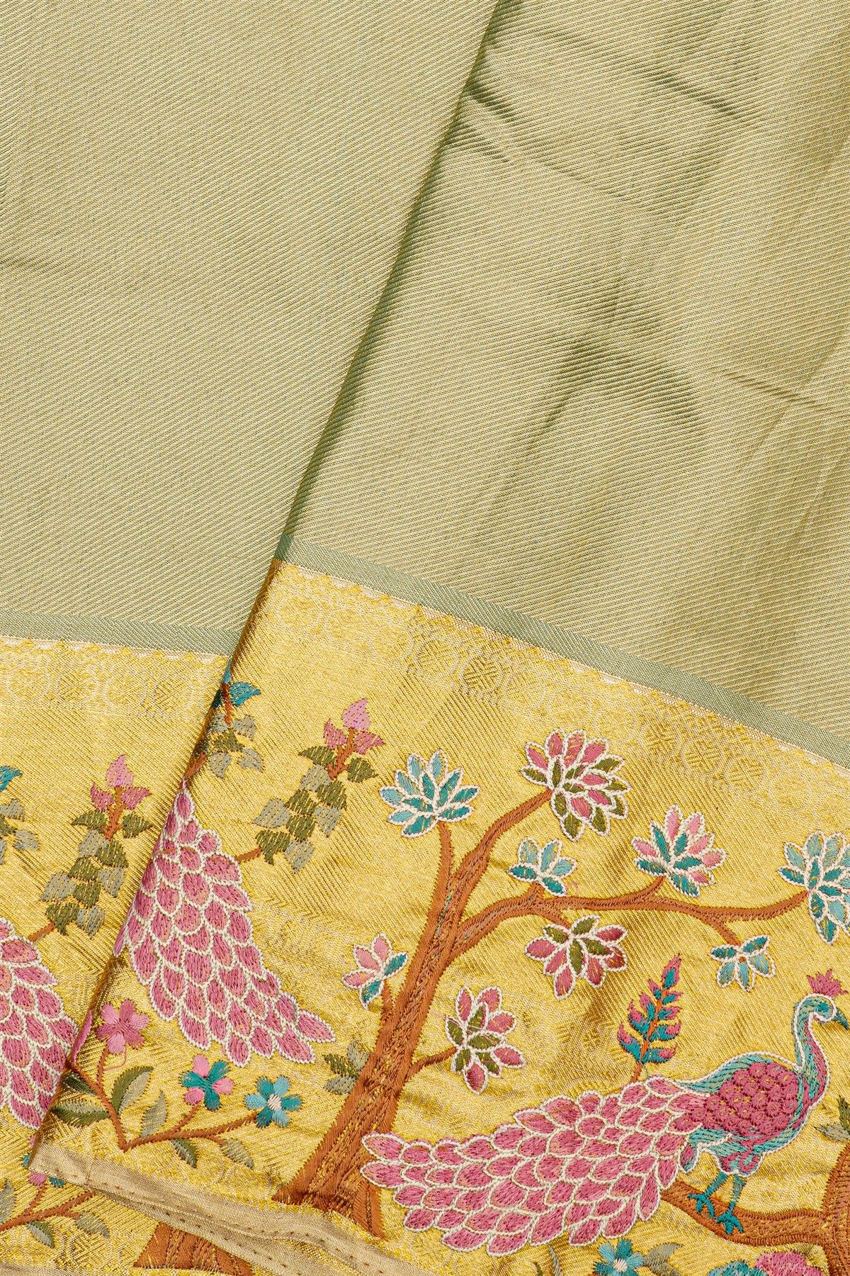 Fusion Kancheepuram Tissue Pista Green Saree With Meenakari Thread Work Border