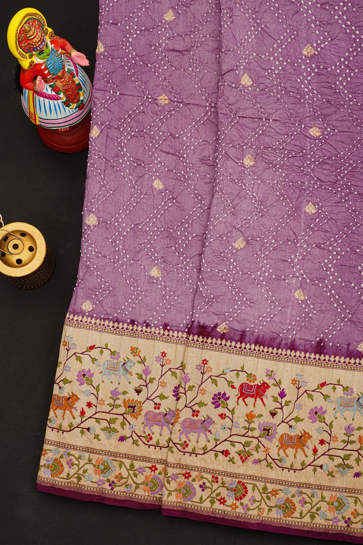 Bandhani Silk Lavender Saree With Florals And Leaves Jaal With Cows Border