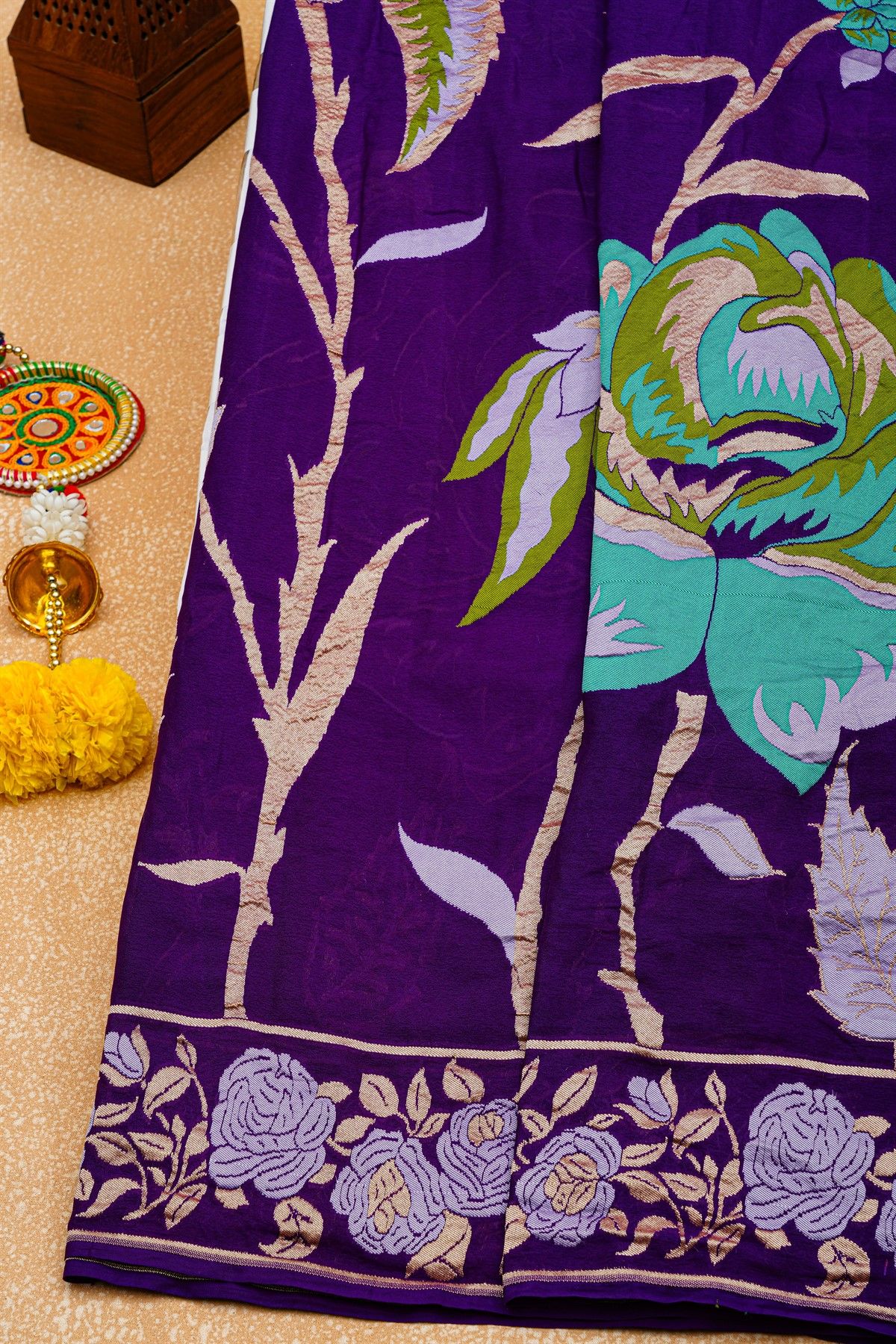 Banarasi Georgette Dark Purple Saree With Florals And Leaves Border