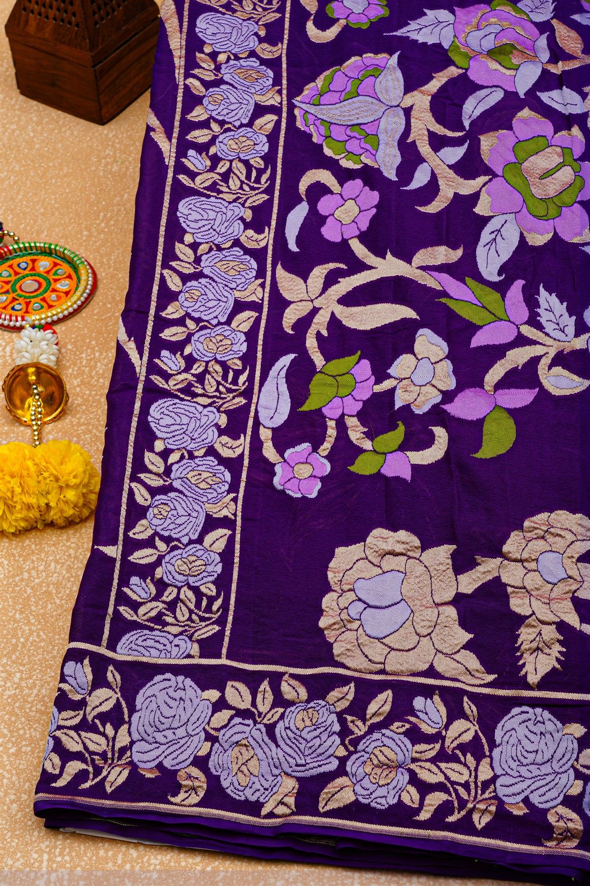 Banarasi Georgette Dark Purple Saree With Florals And Leaves Border