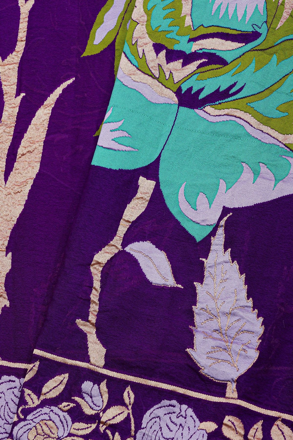 Banarasi Georgette Dark Purple Saree With Florals And Leaves Border